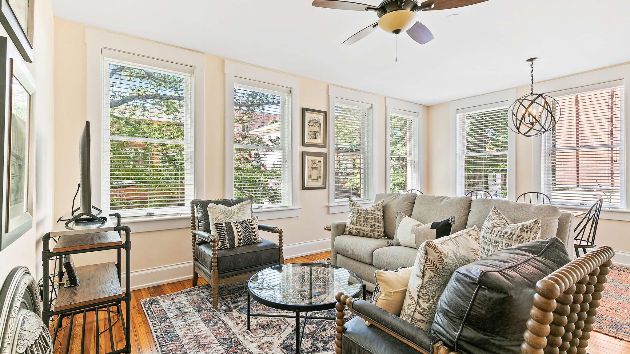 Bright living room with large windows.