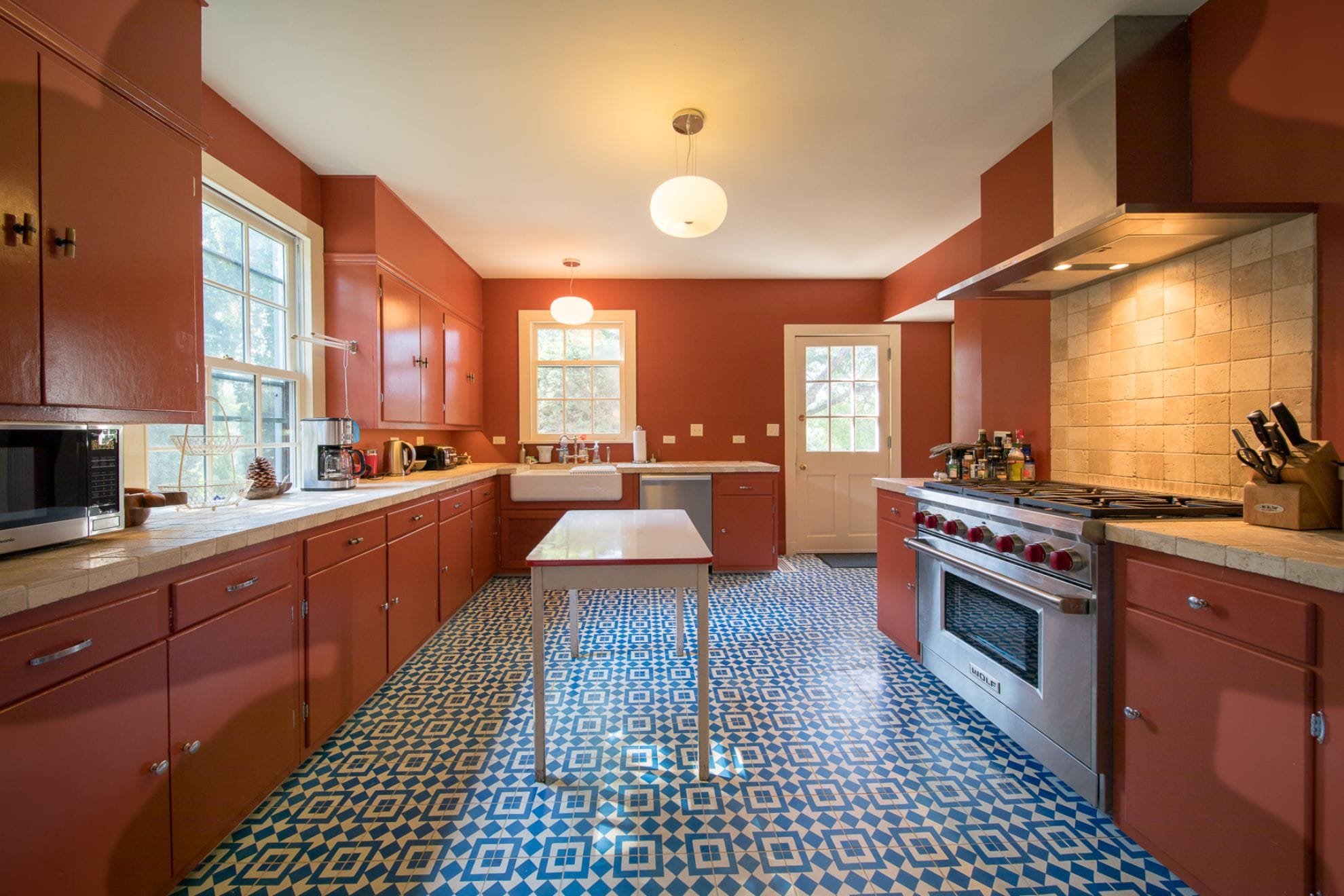 Retro kitchen with red cabinets.