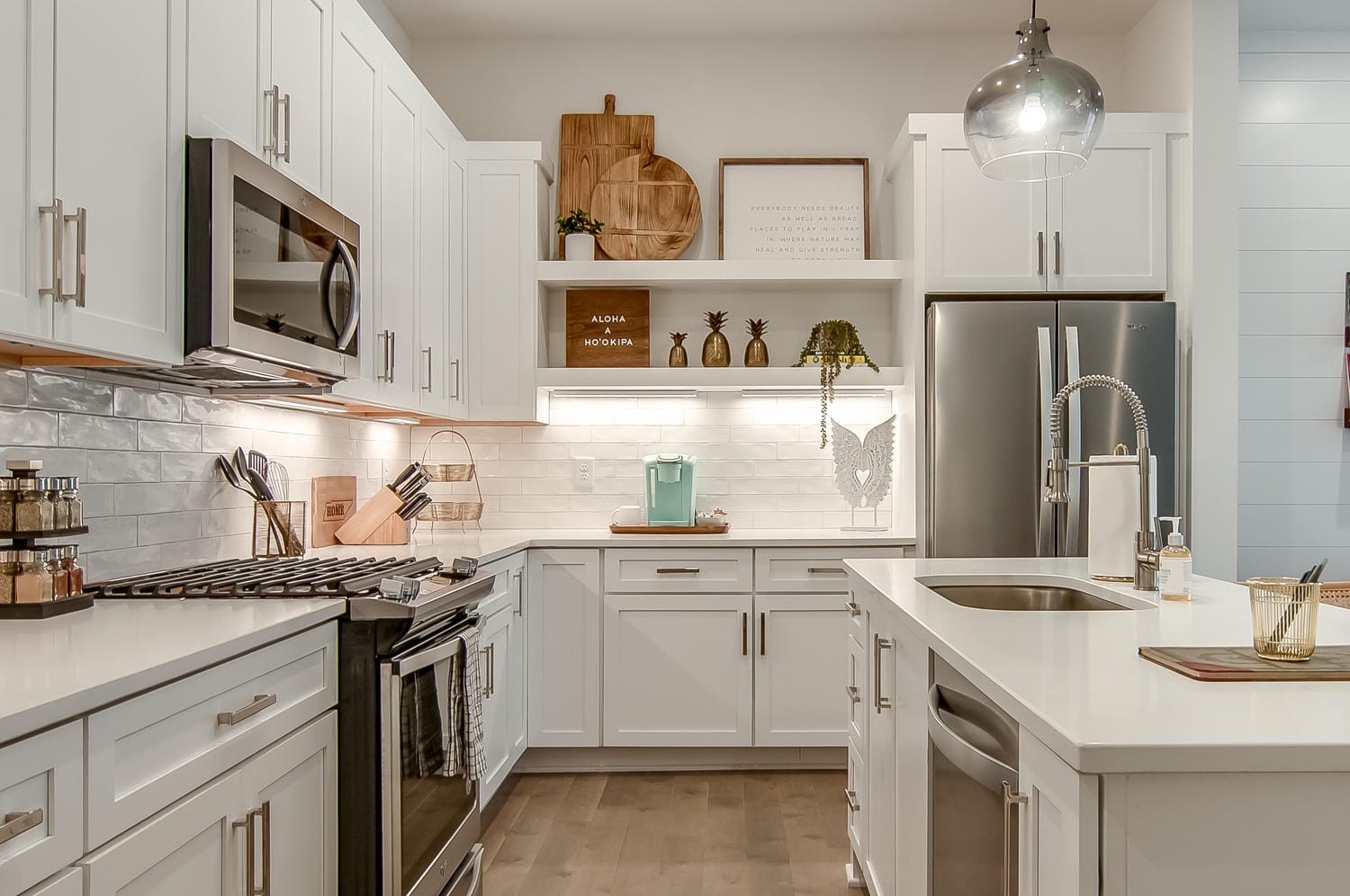 Modern kitchen with white cabinets.