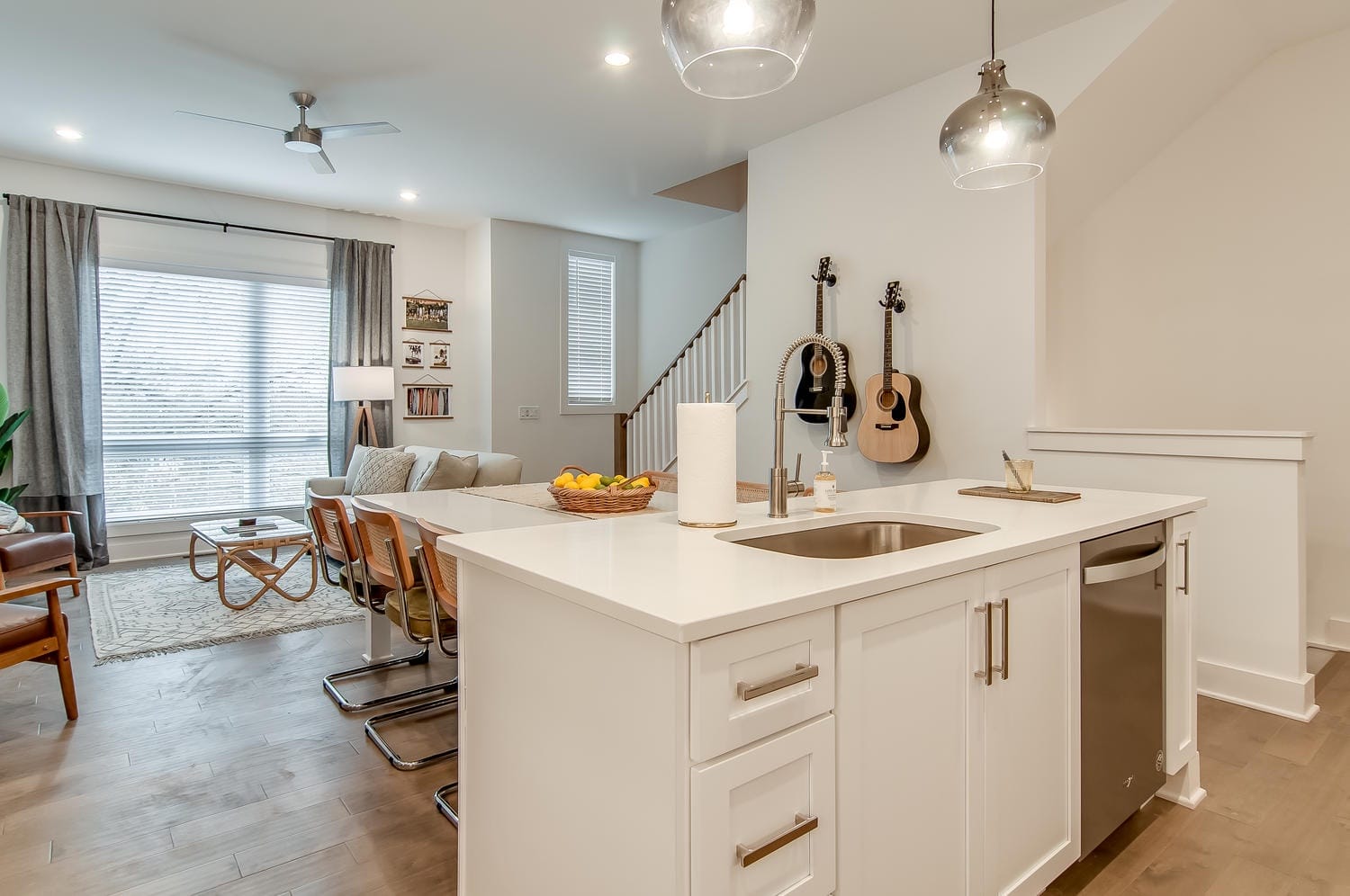 Modern living room with kitchen island.