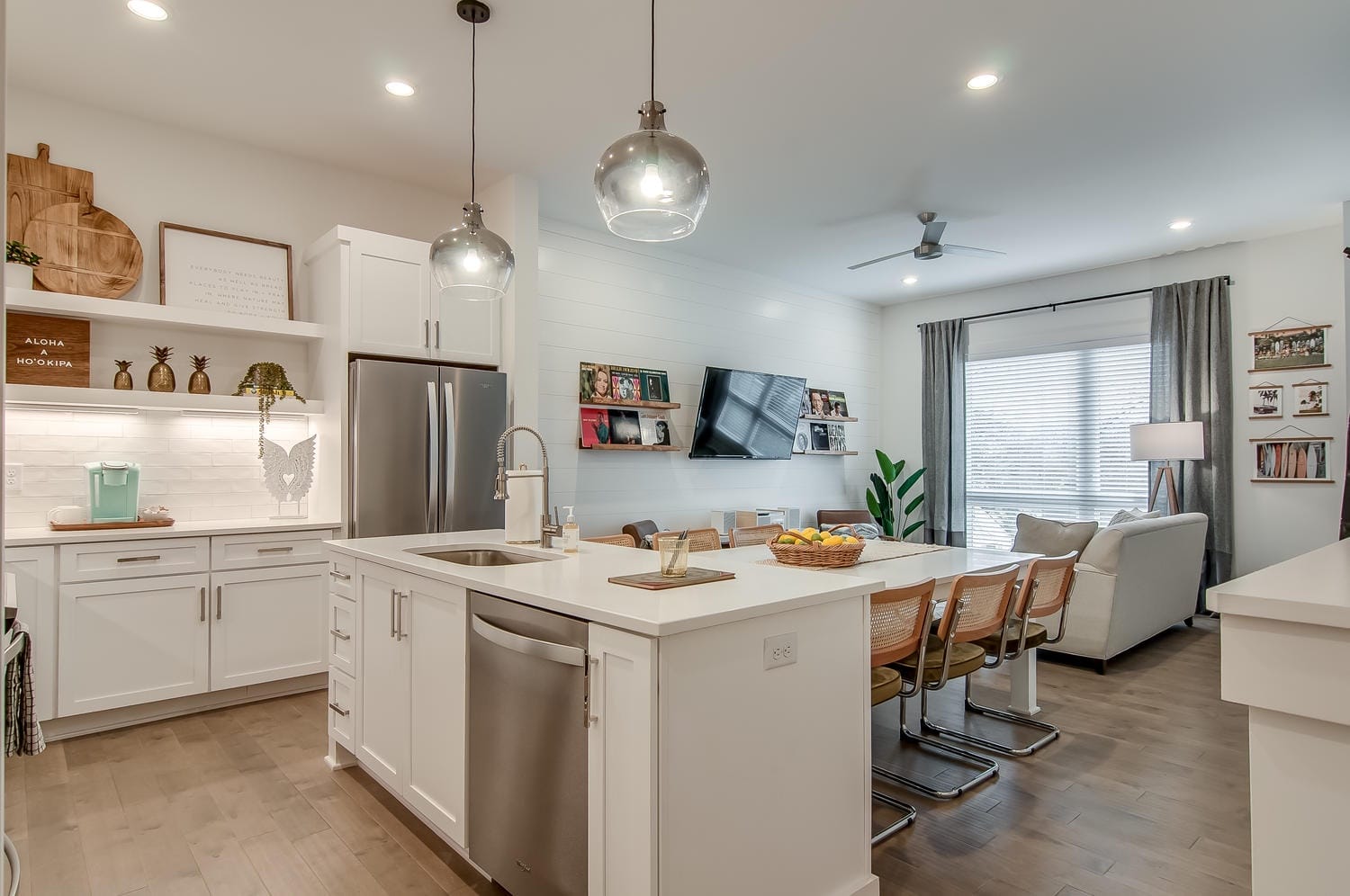 Modern open-concept kitchen and living area.