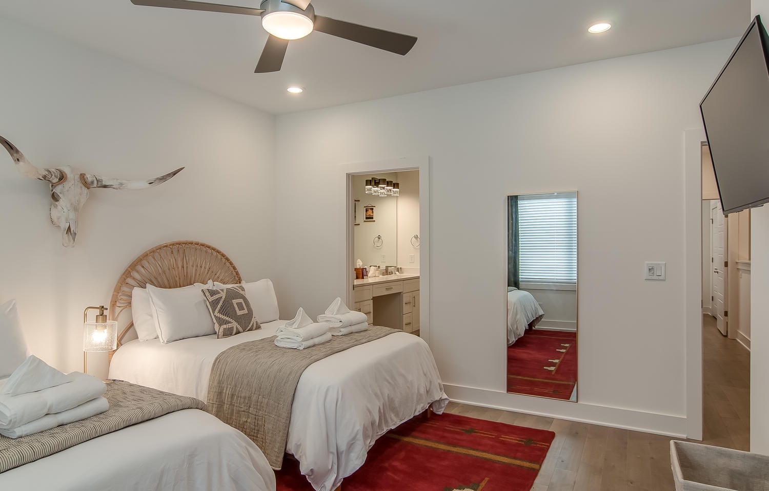 Modern bedroom with two beds.