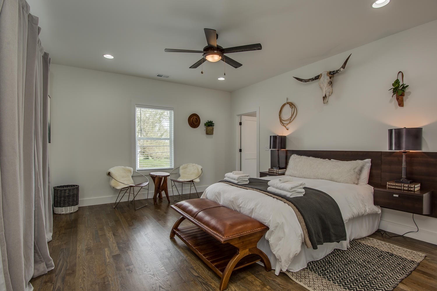 Modern bedroom with rustic decor.