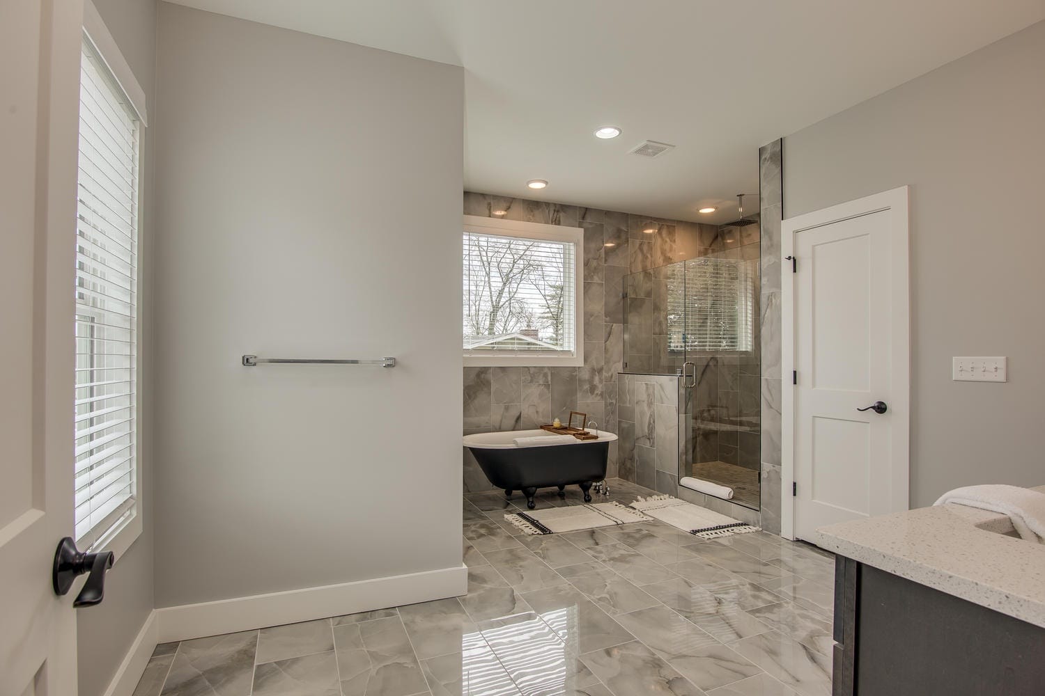 Modern bathroom with tub and shower.