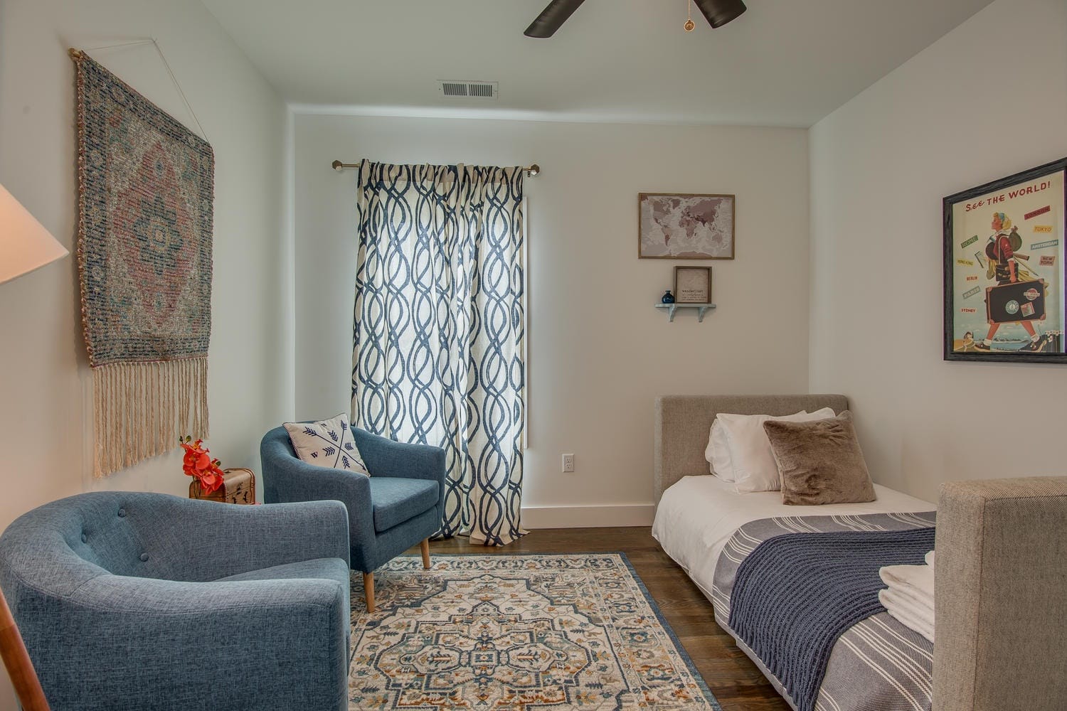 Cozy room with bed and chairs