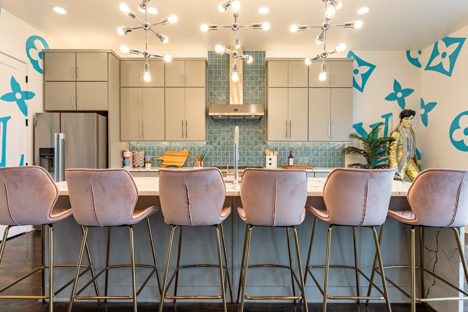 Modern kitchen with pink stools