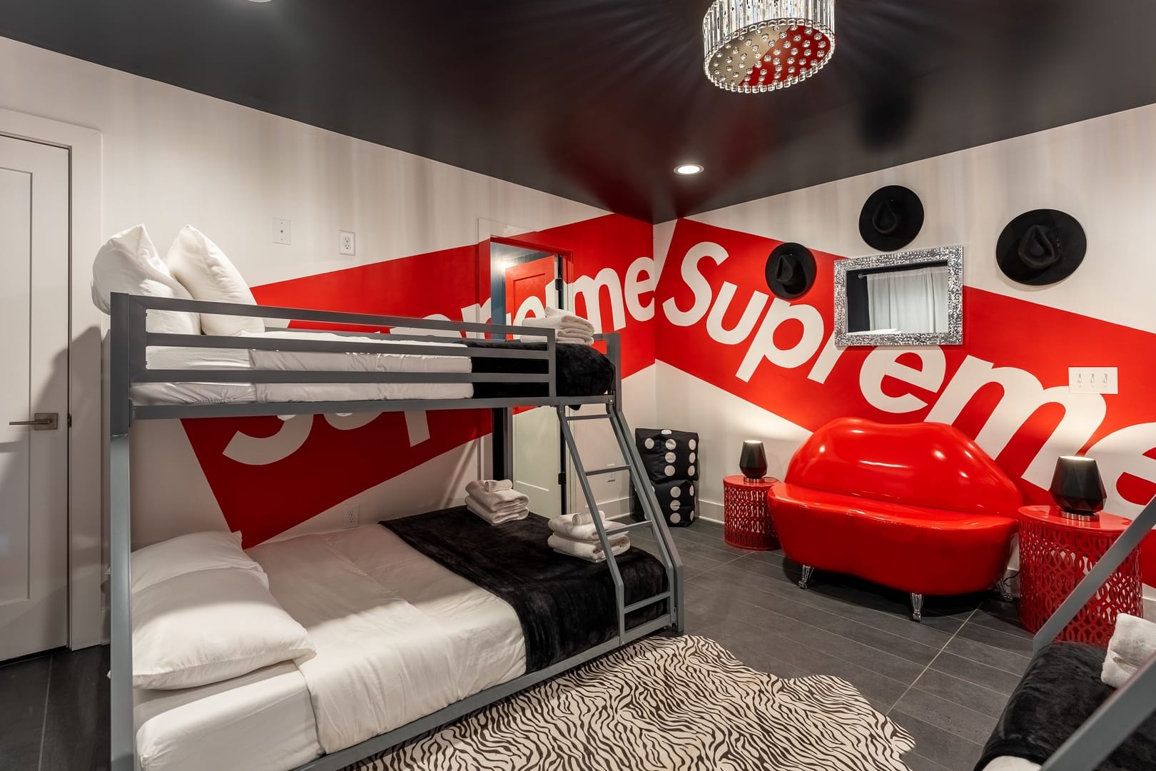 Supreme-themed bunk bed bedroom.