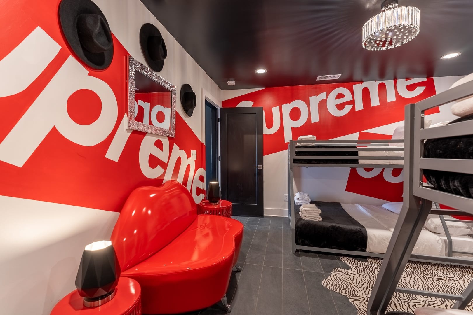 Supreme-themed room with bunk beds.