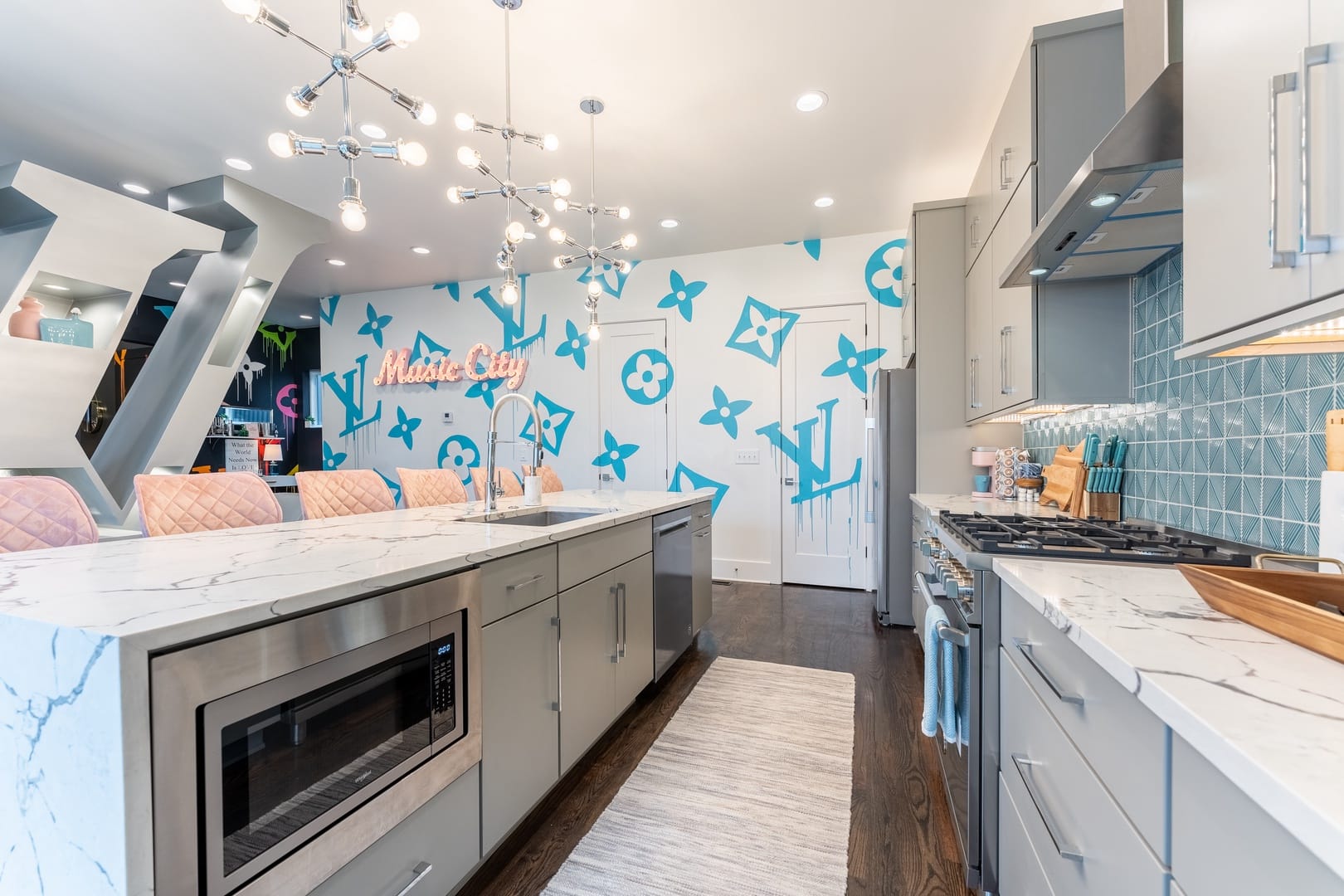 Modern kitchen with branded mural wall.