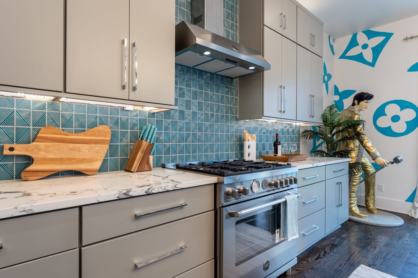 Modern kitchen with Elvis statue.