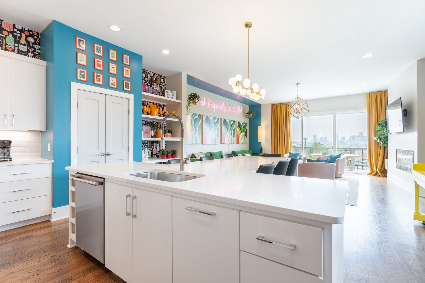 Colorful modern kitchen and living area.