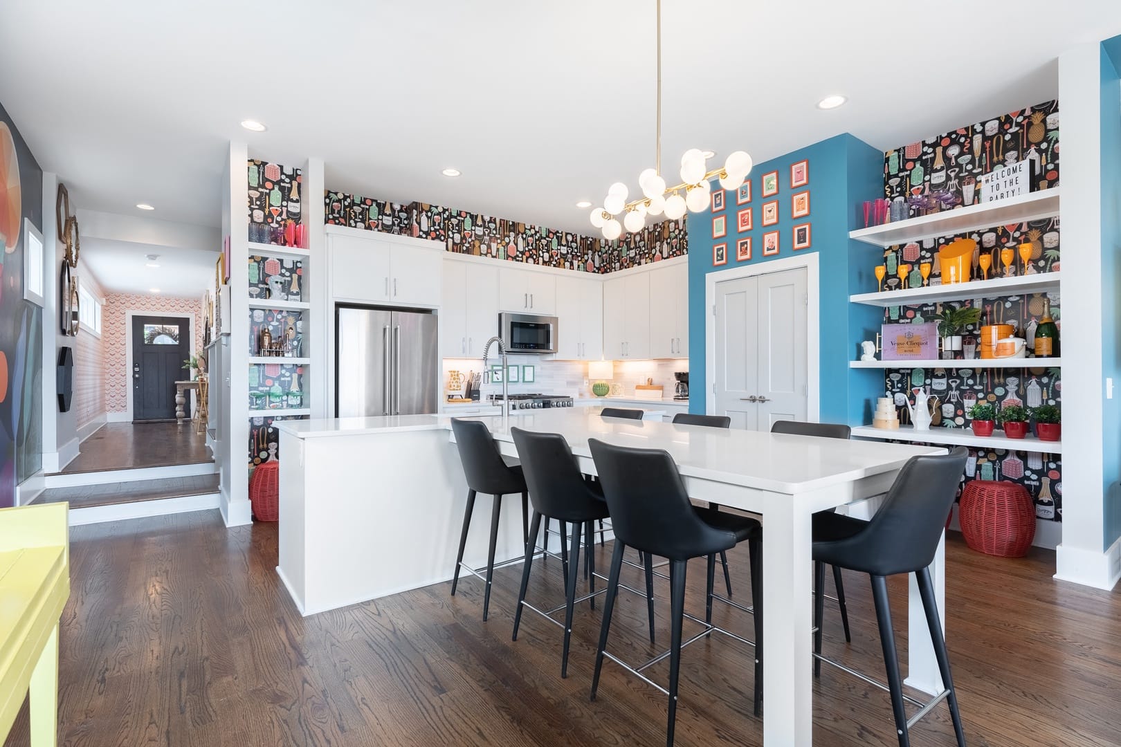 Modern kitchen with colorful decor.