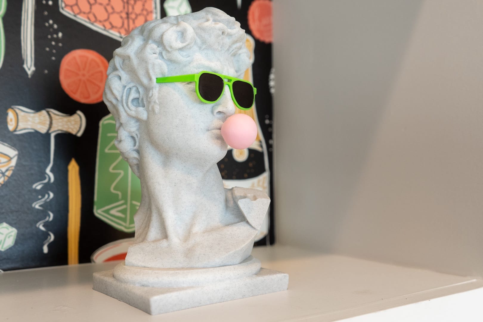 Bust statue with sunglasses, bubblegum.