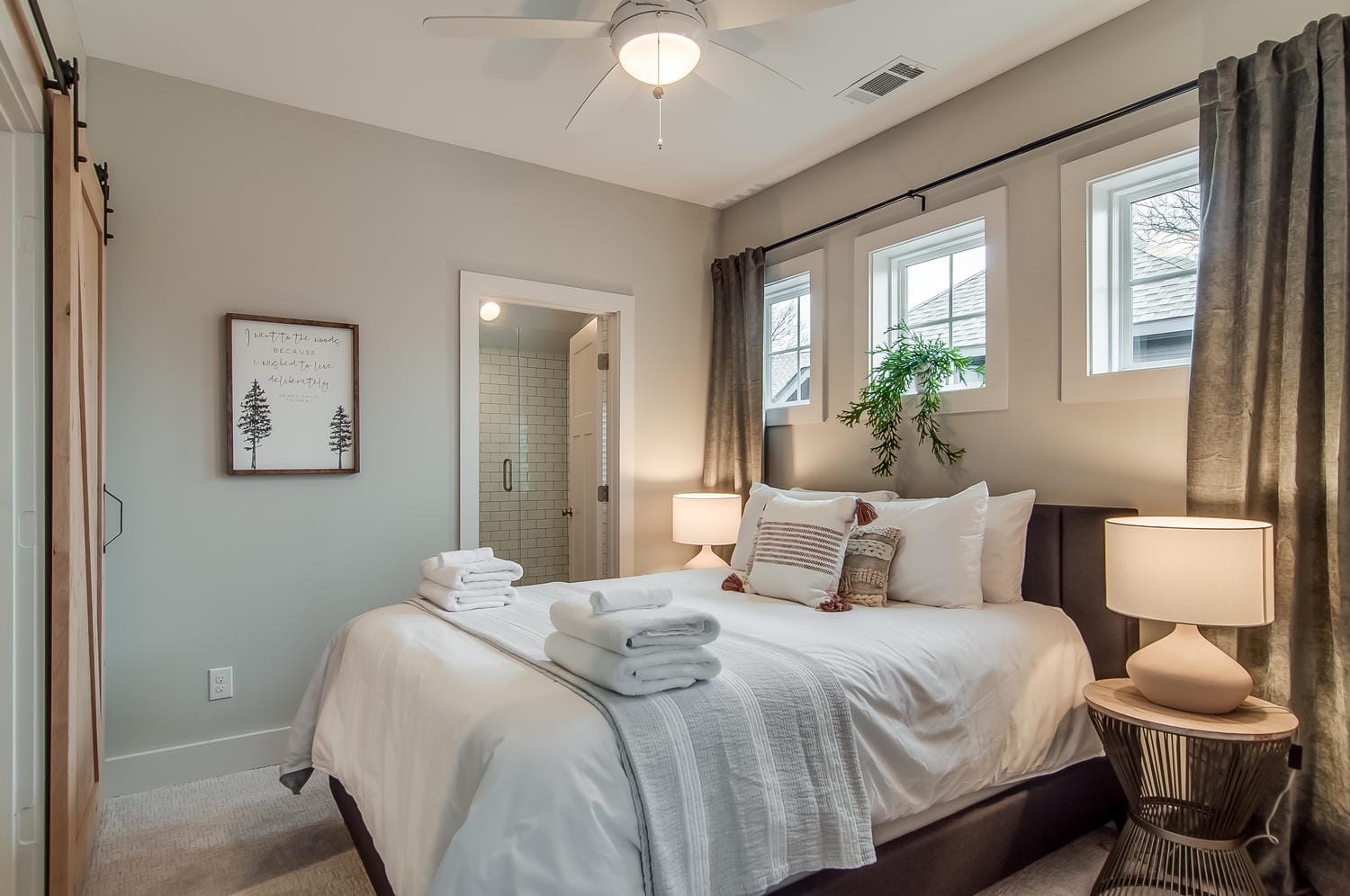 Modern bedroom with attached bathroom.