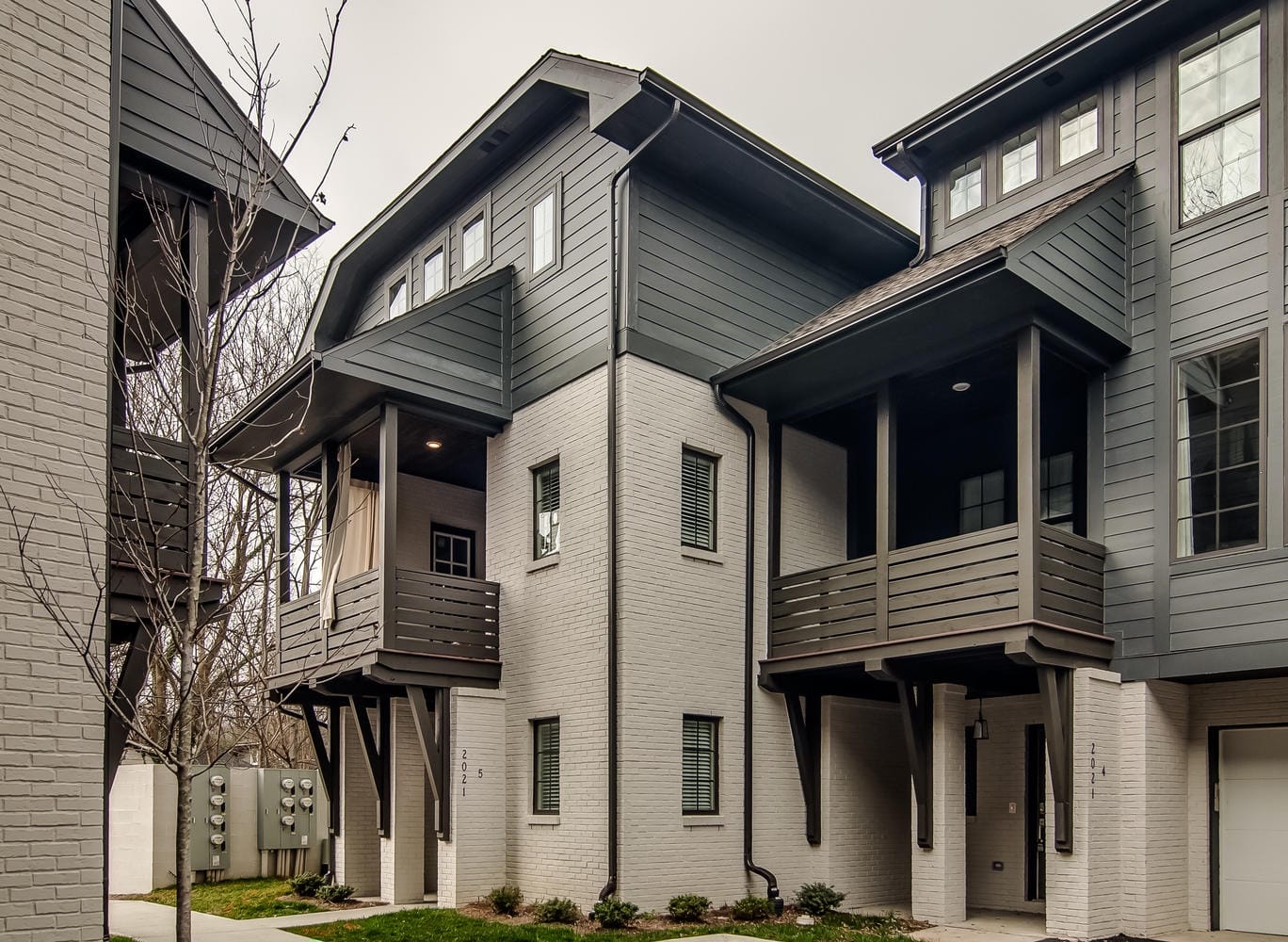 Modern townhouse with balconies.