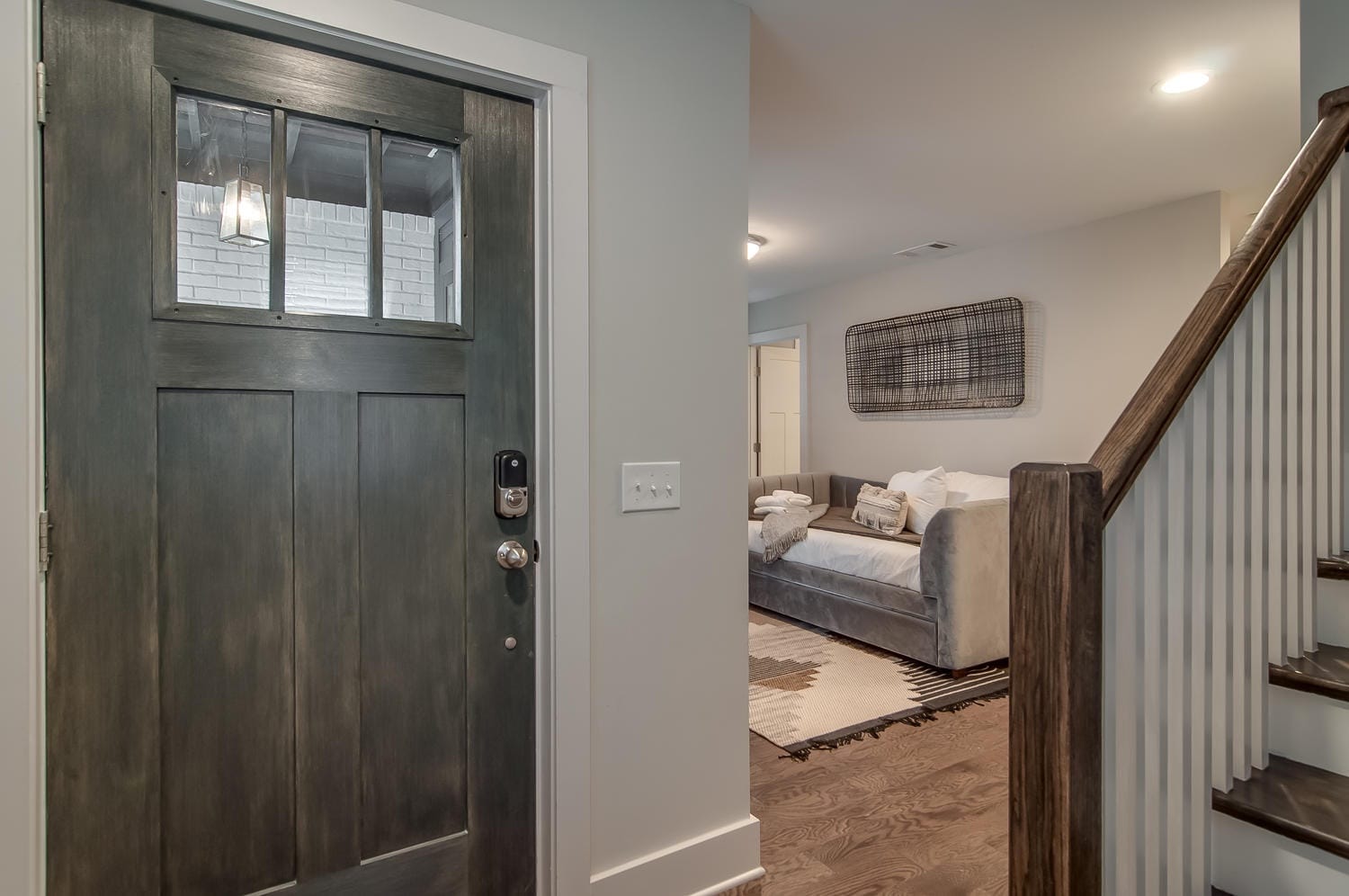 Entrance door and cozy living room.