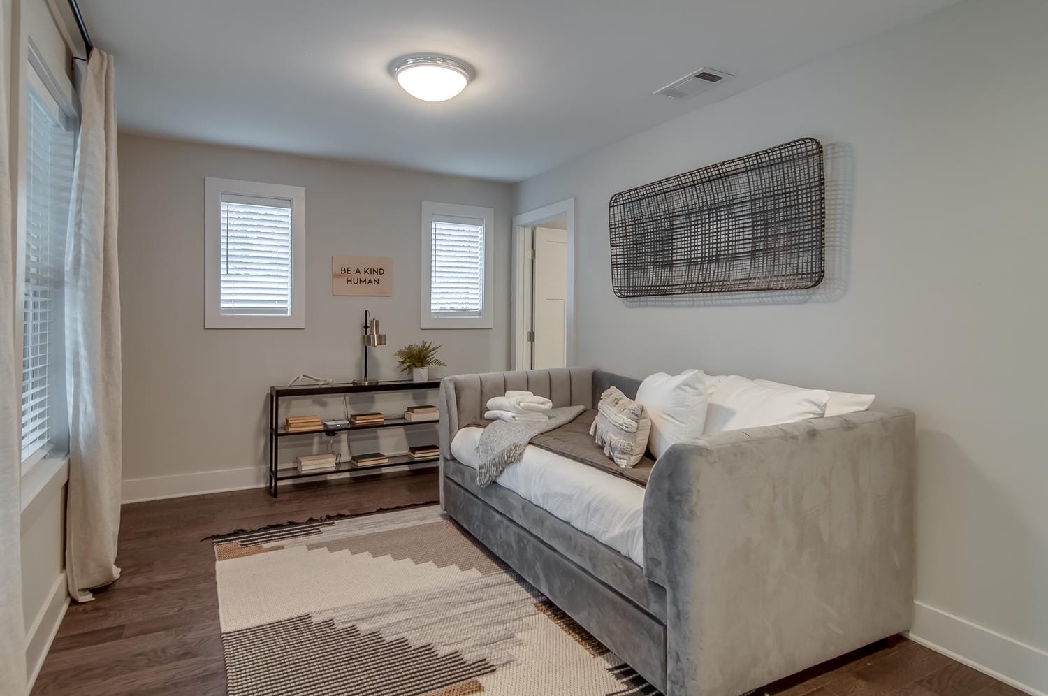 Modern room with gray daybed.