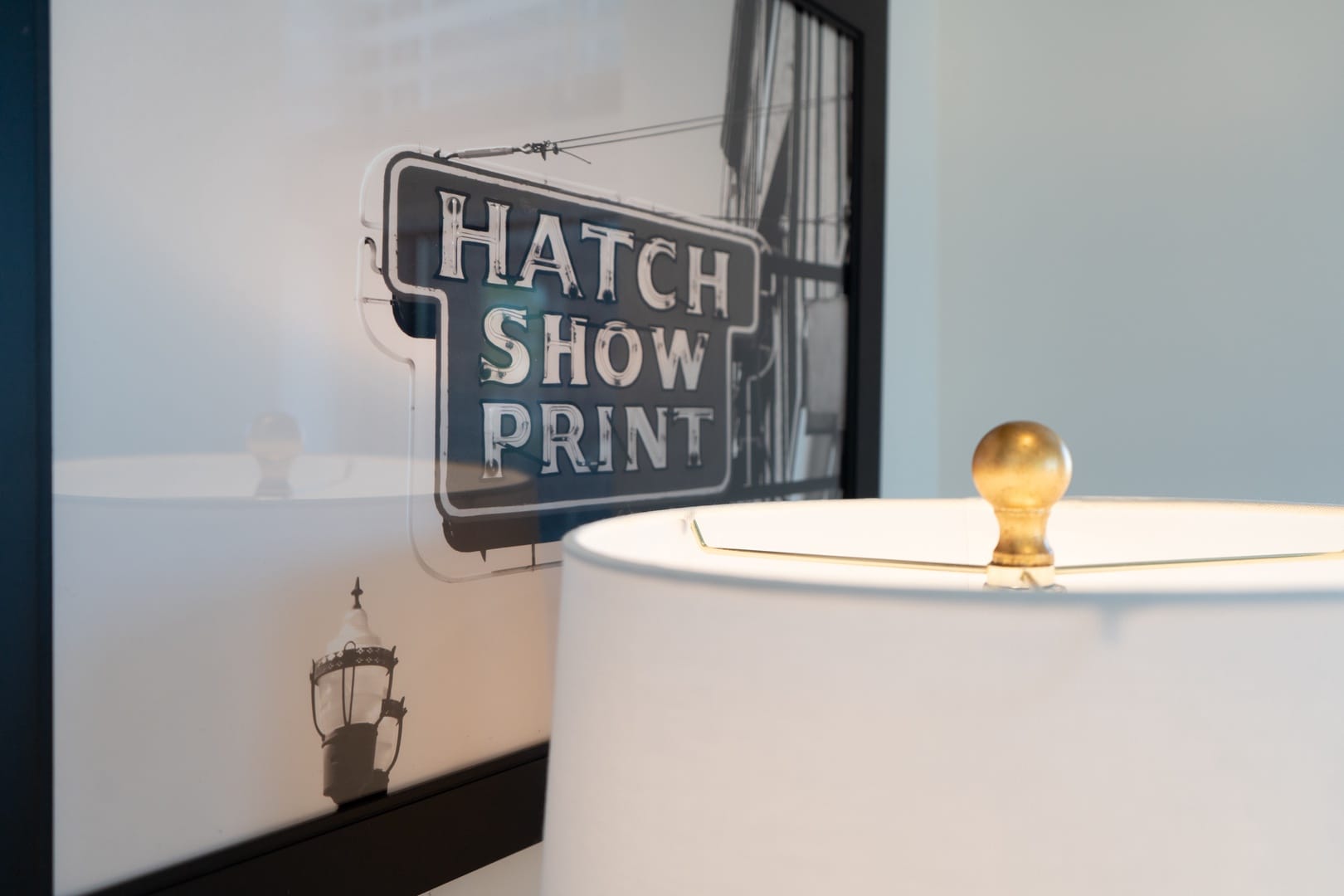 "Hatch Show Print" sign reflection.