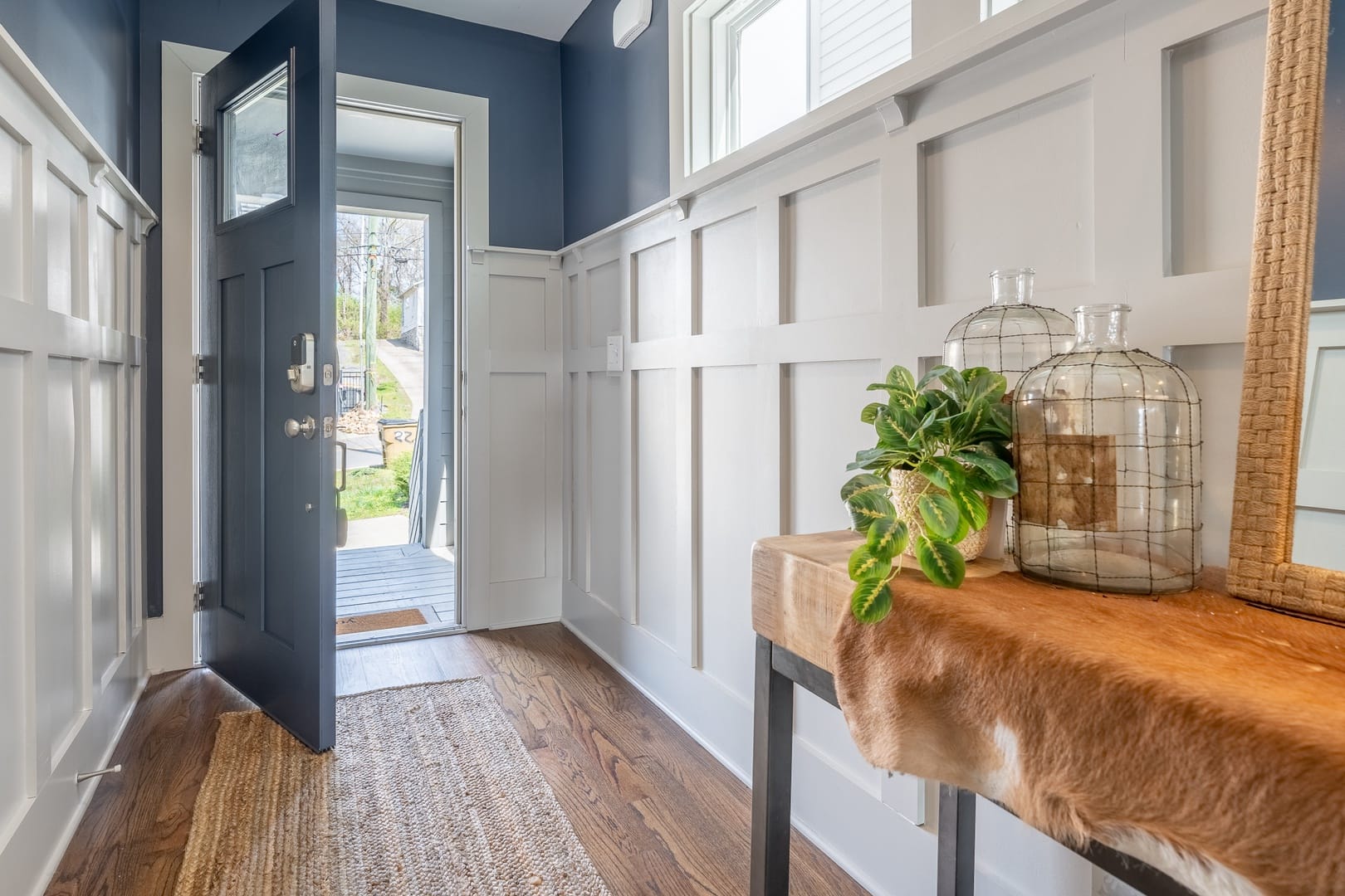 Open front door to hallway.