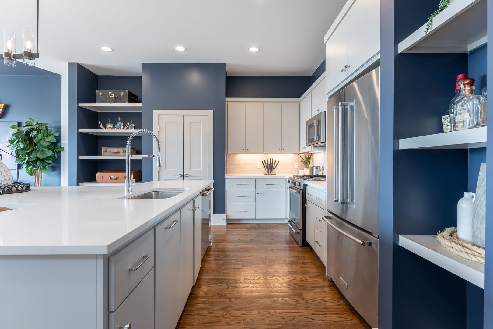 Modern kitchen with blue accents.