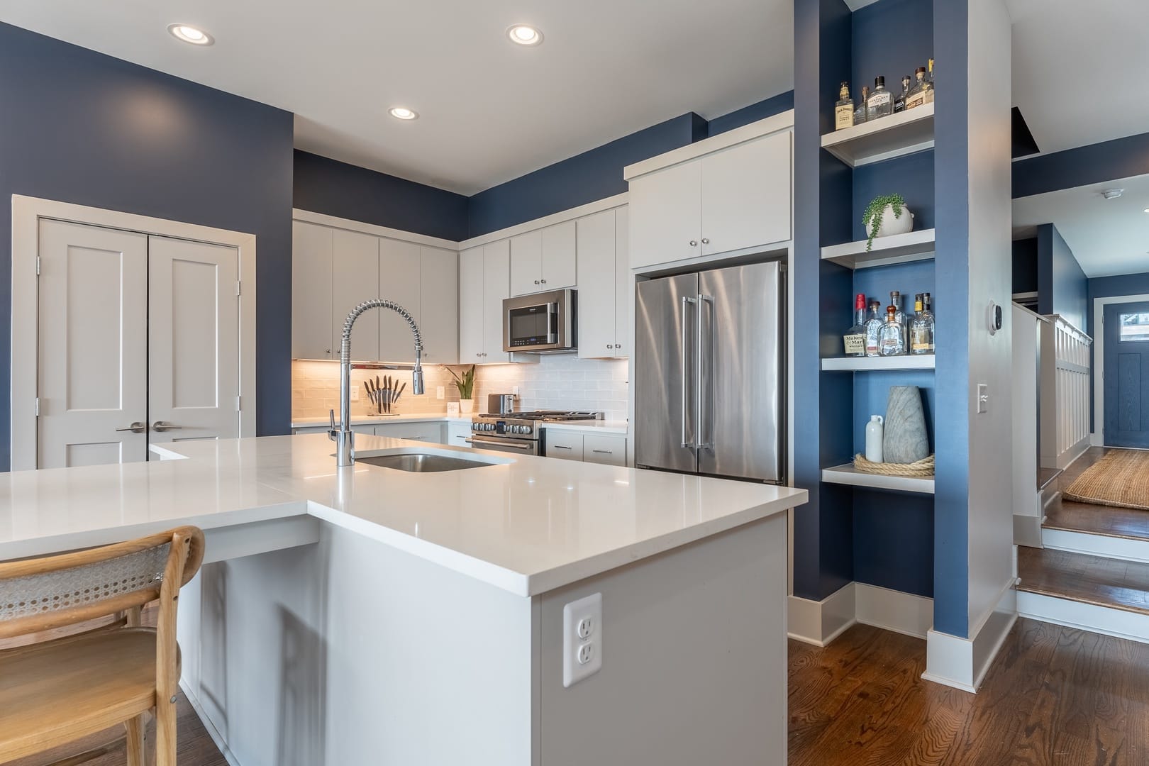 Modern kitchen with blue accents.