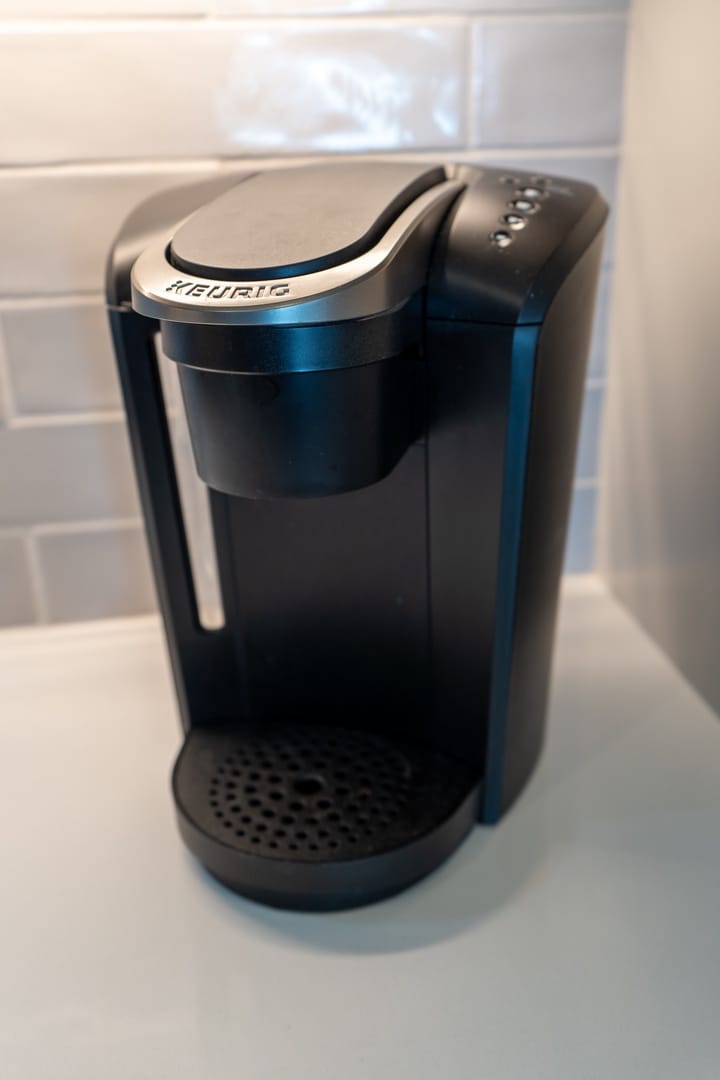 Black Keurig coffee maker.