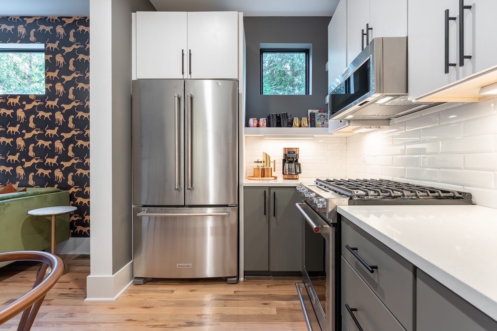 Modern kitchen with stainless-steel appliances.