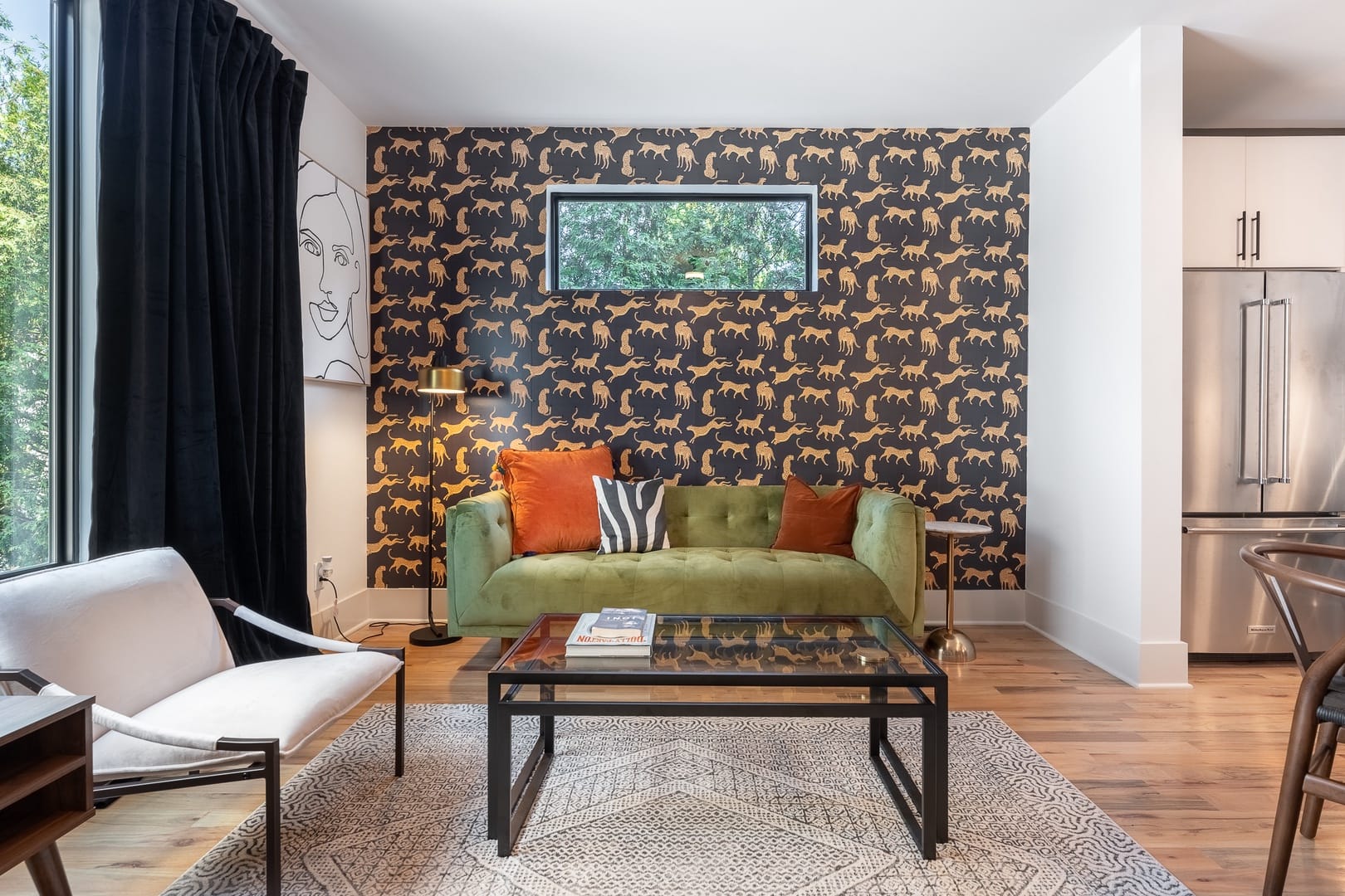 Stylish living room with animal wallpaper.