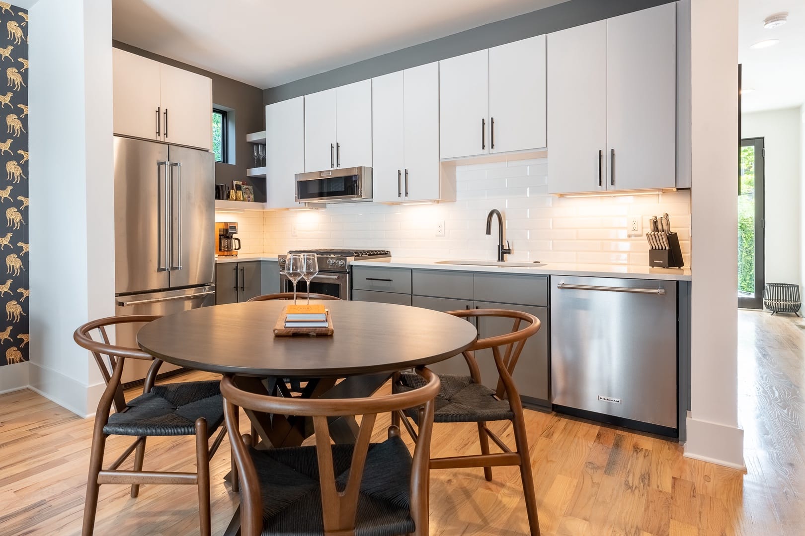 Modern kitchen and dining area.