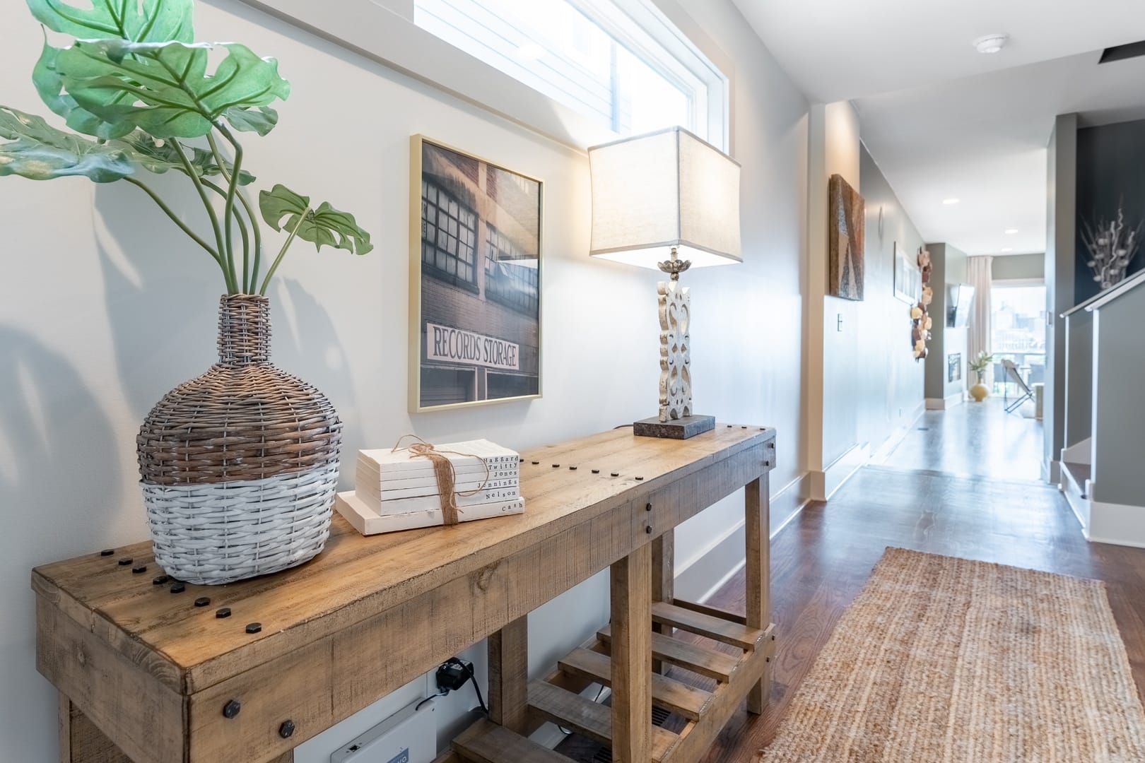 Decorative hallway table with lamp.