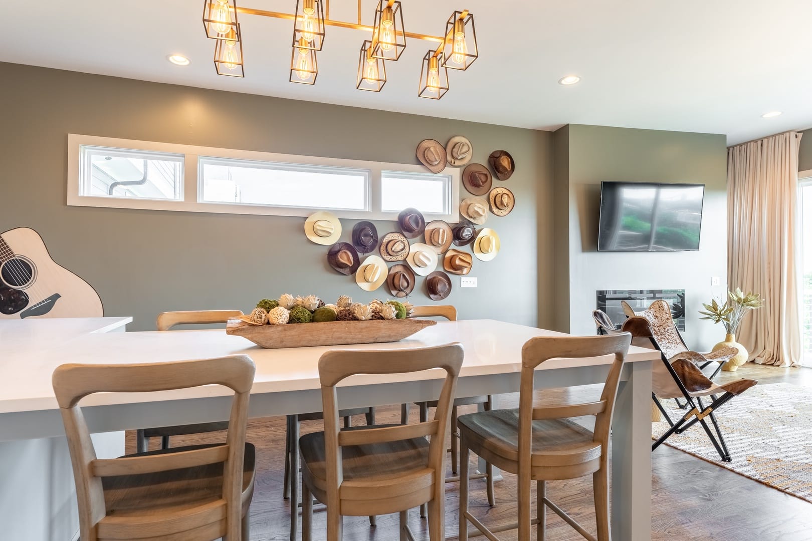 Dining area with hats on wall.