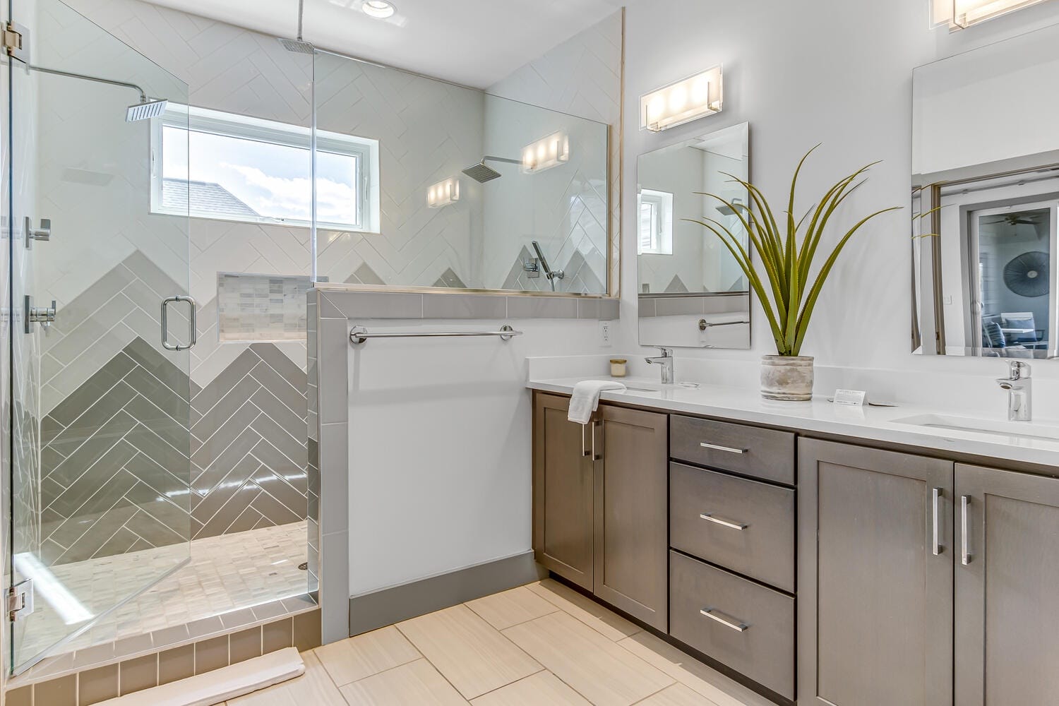 Modern bathroom with glass shower door.