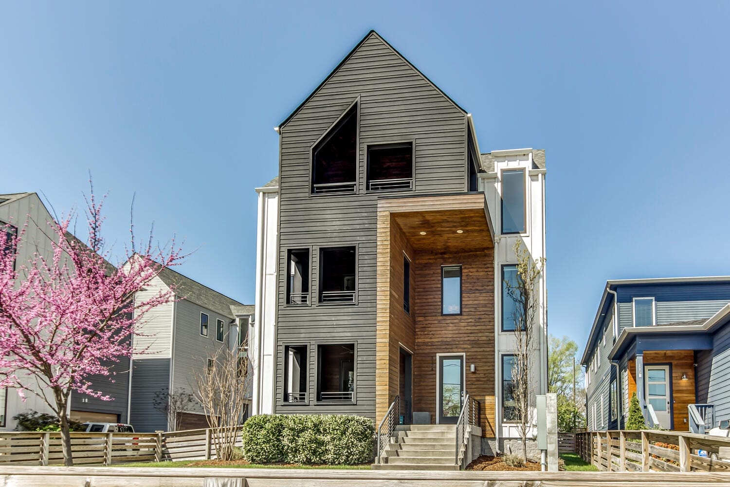 Modern three-story house exterior.