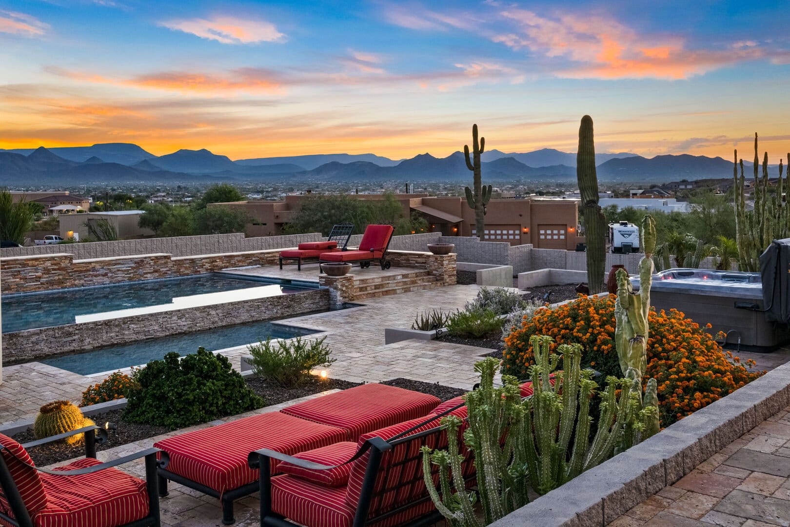 Desert backyard pool at sunset.