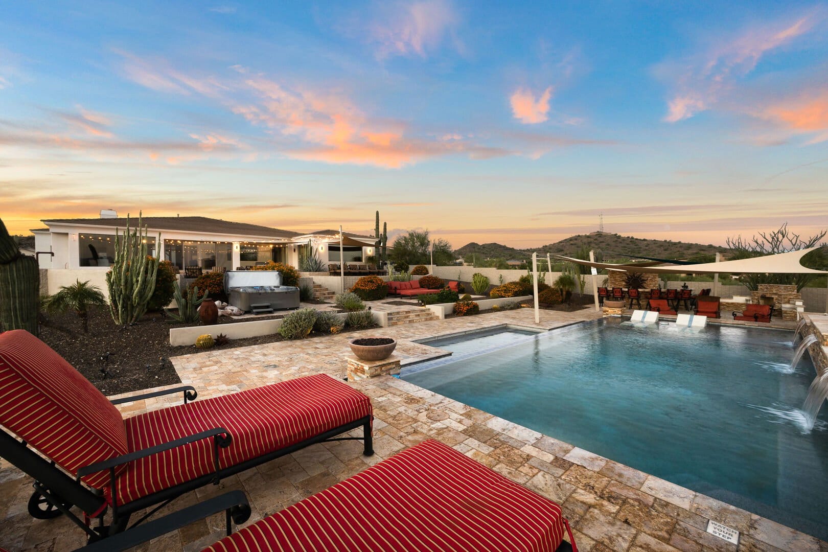 Poolside patio with lounge chairs.