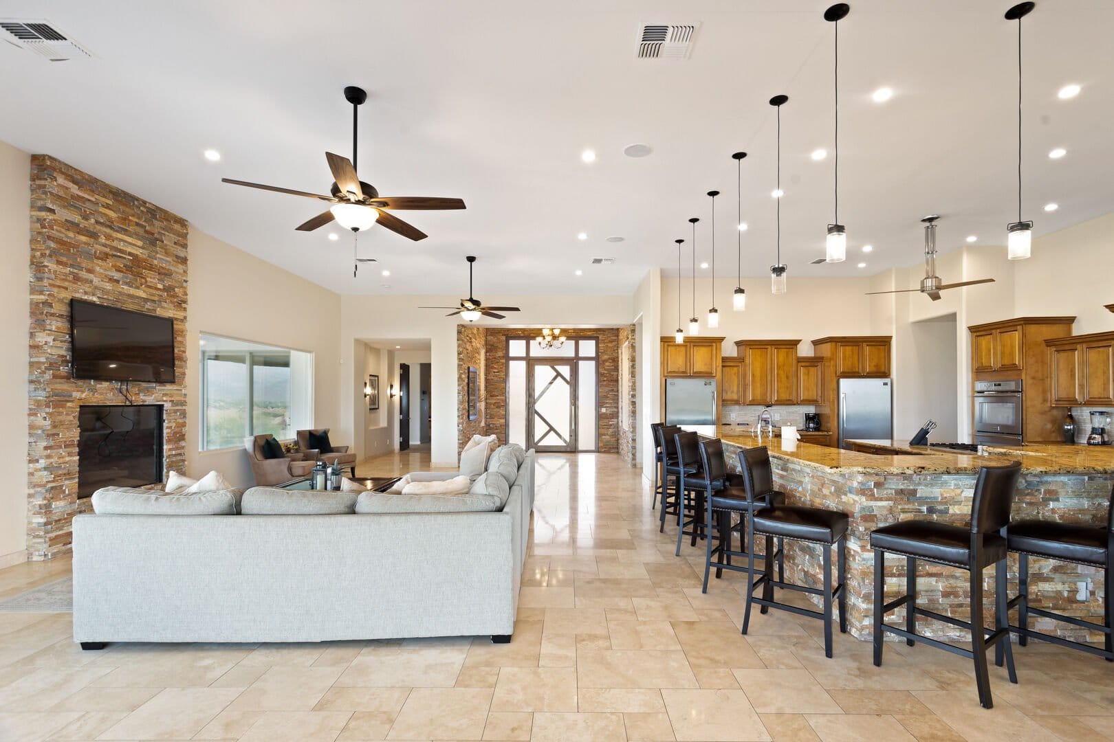 Spacious open-concept kitchen and living area.