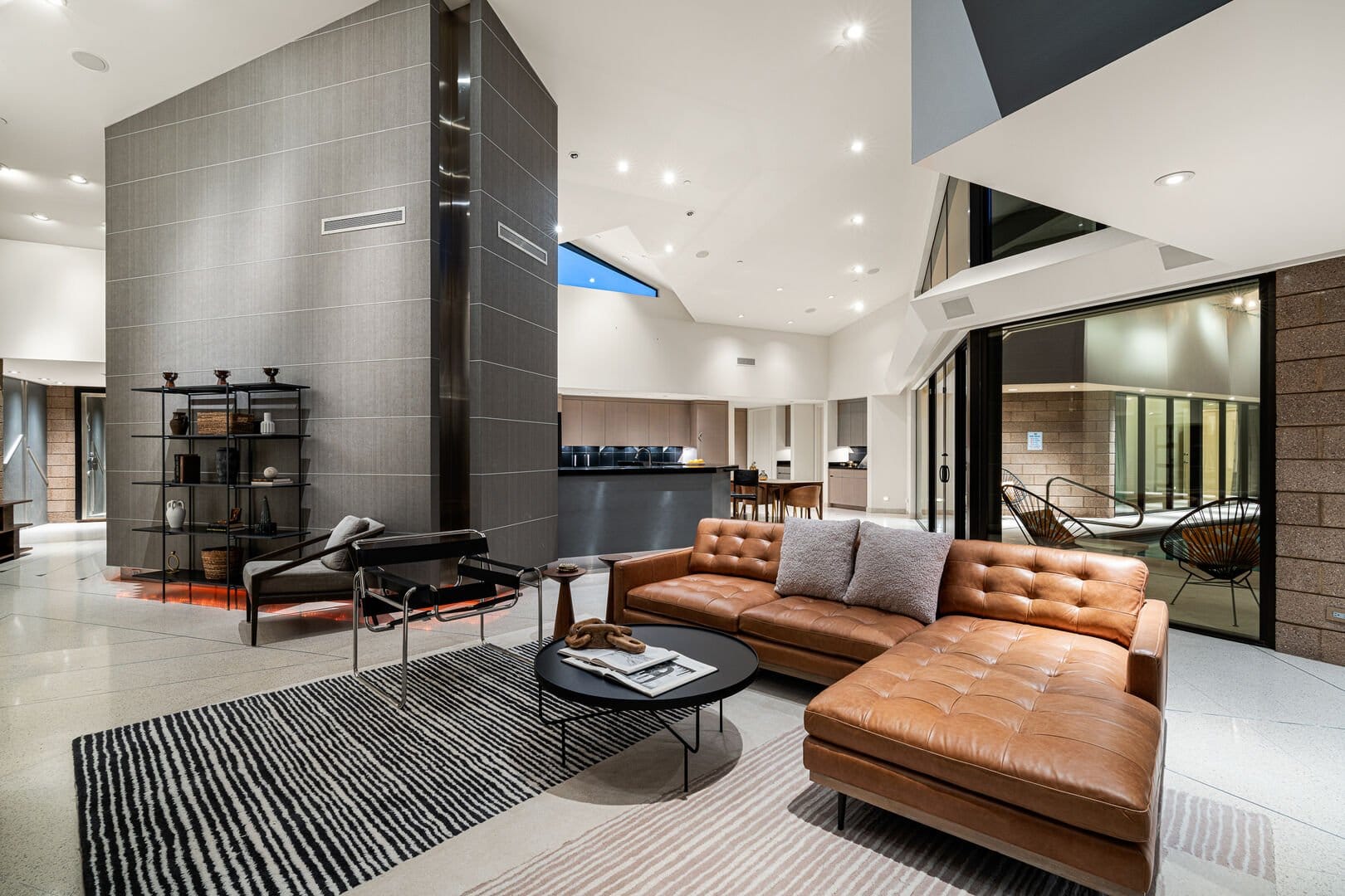 Modern living room with brown couch.