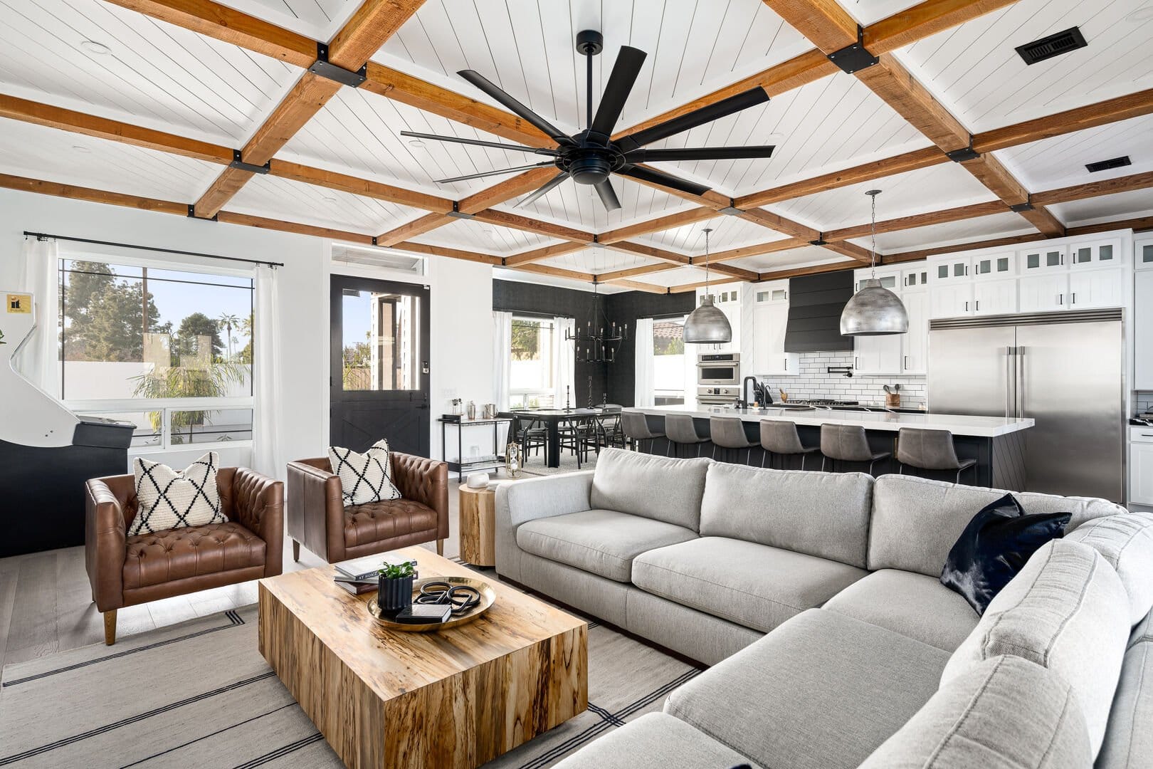 Modern living room and kitchen area.