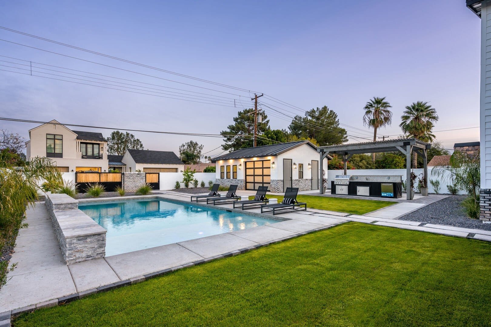 Modern backyard with pool.