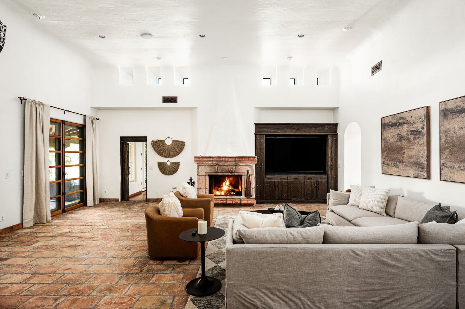 Spacious living room with fireplace.