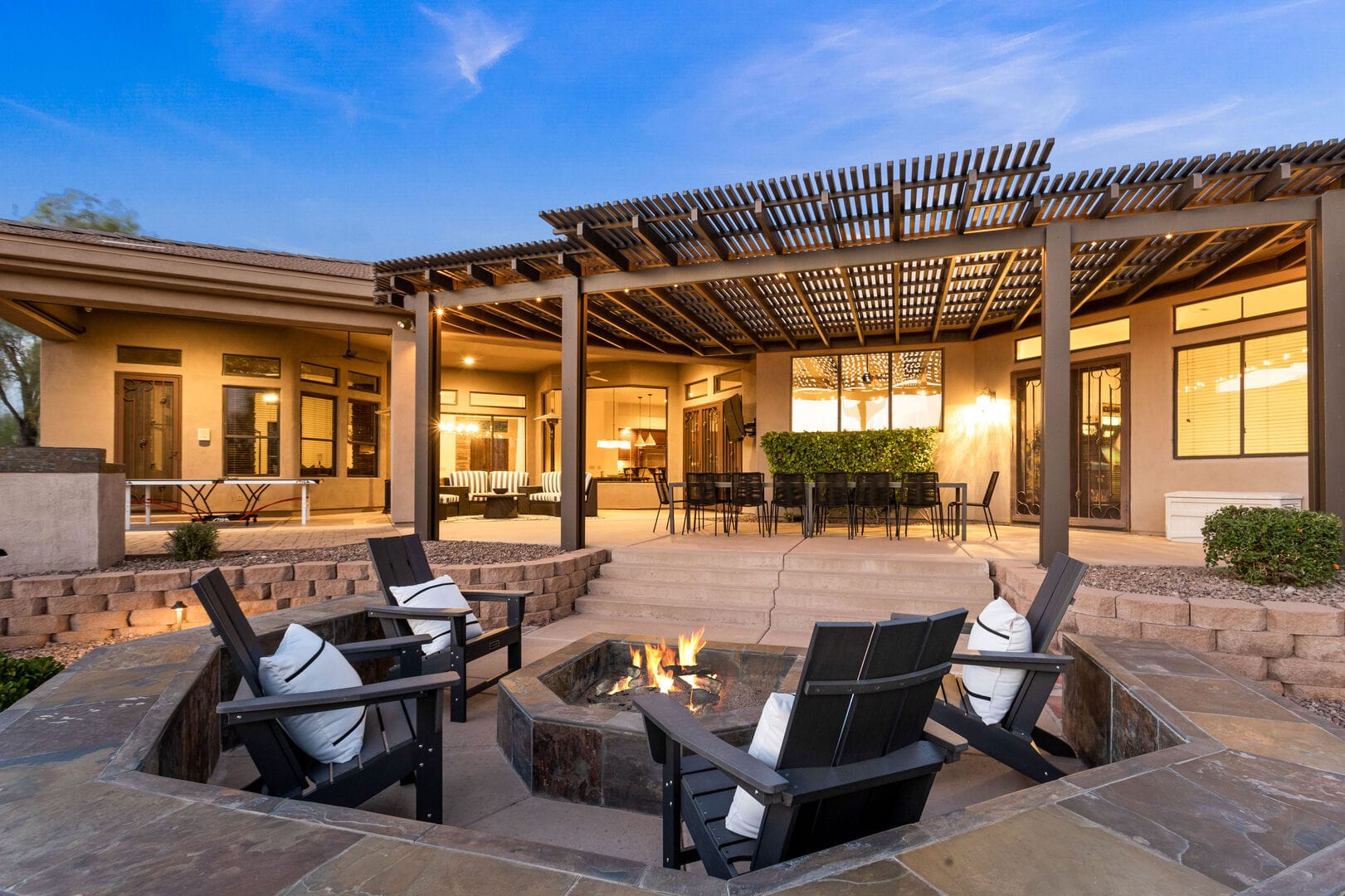 Patio with fire pit and seating.