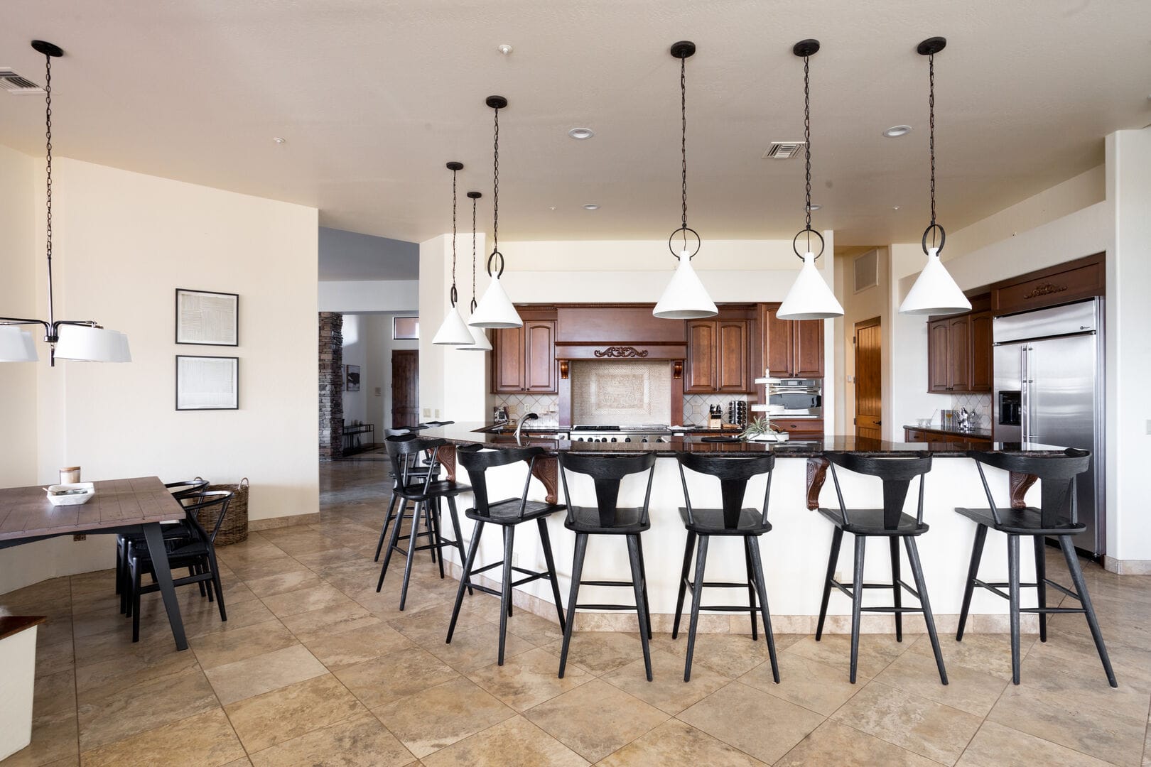 Modern kitchen with bar seating.