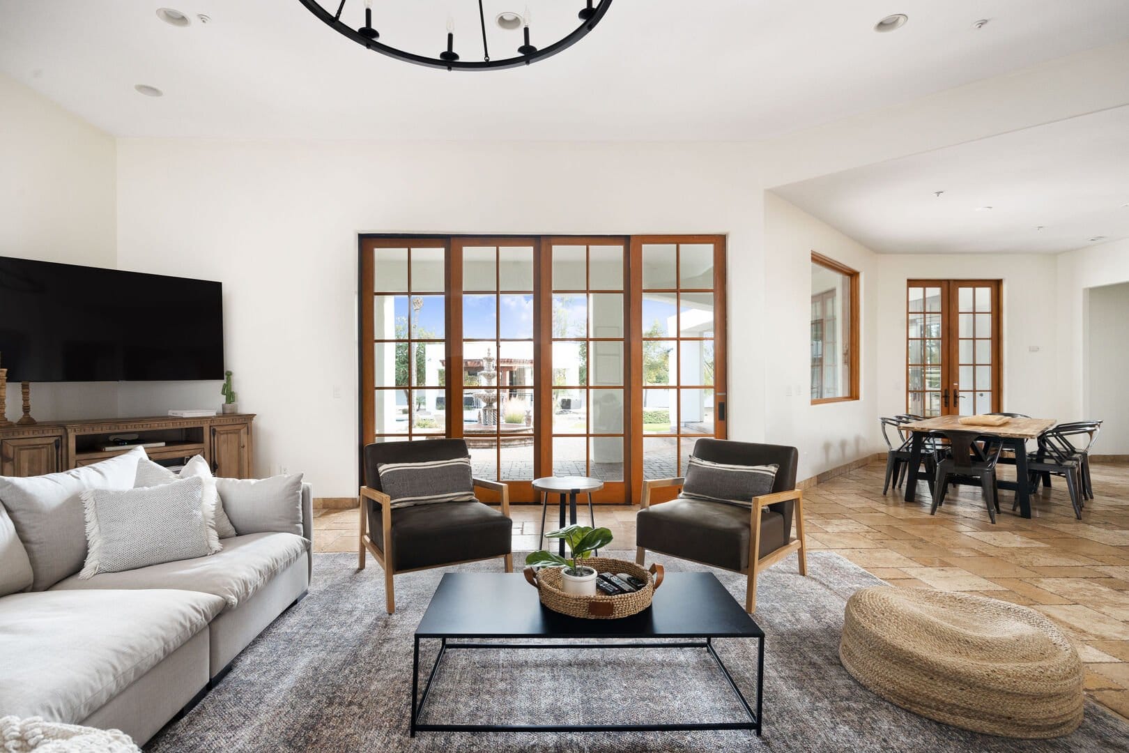 Modern living room with large windows.