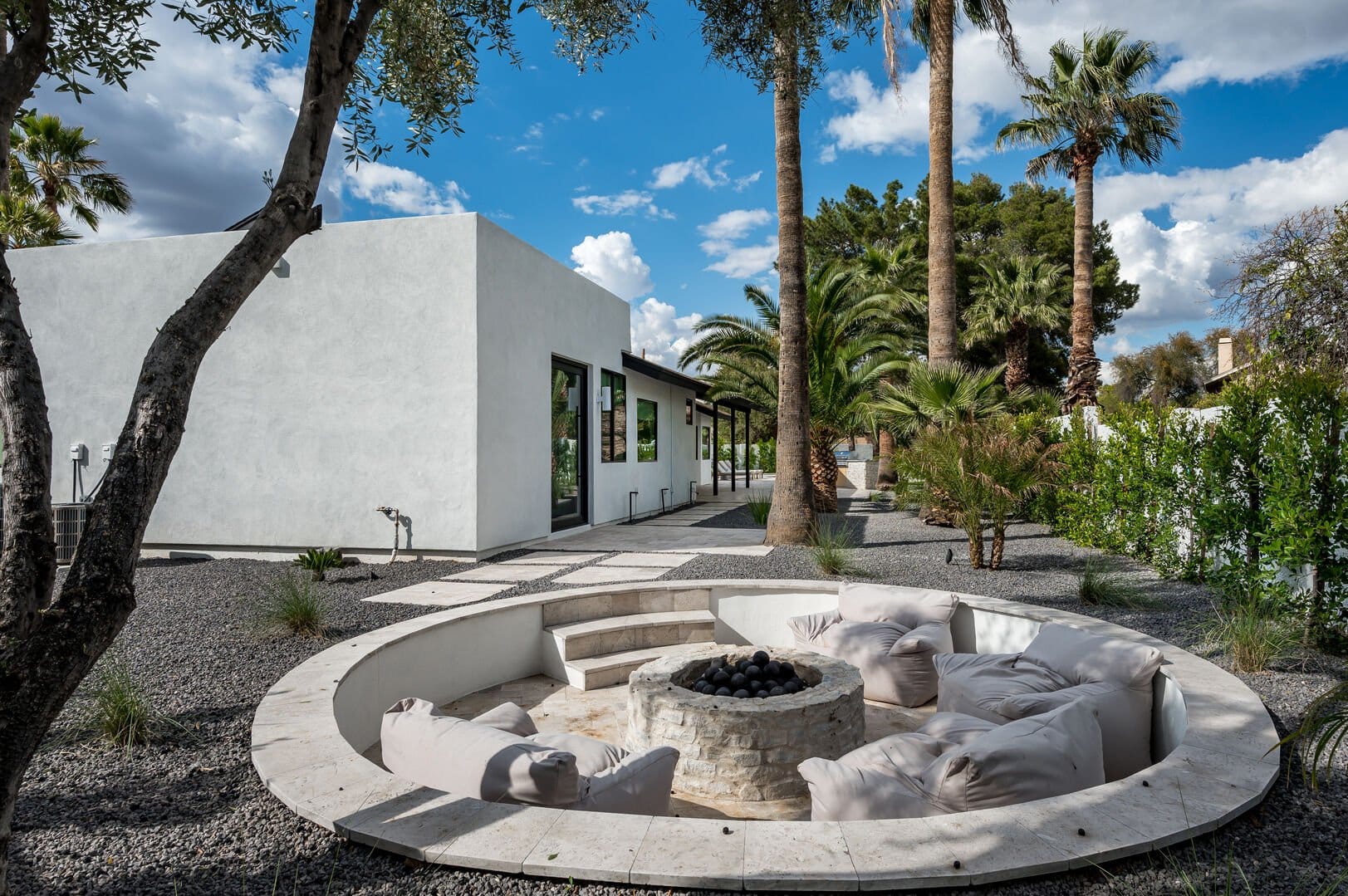 Modern outdoor fire pit lounge.