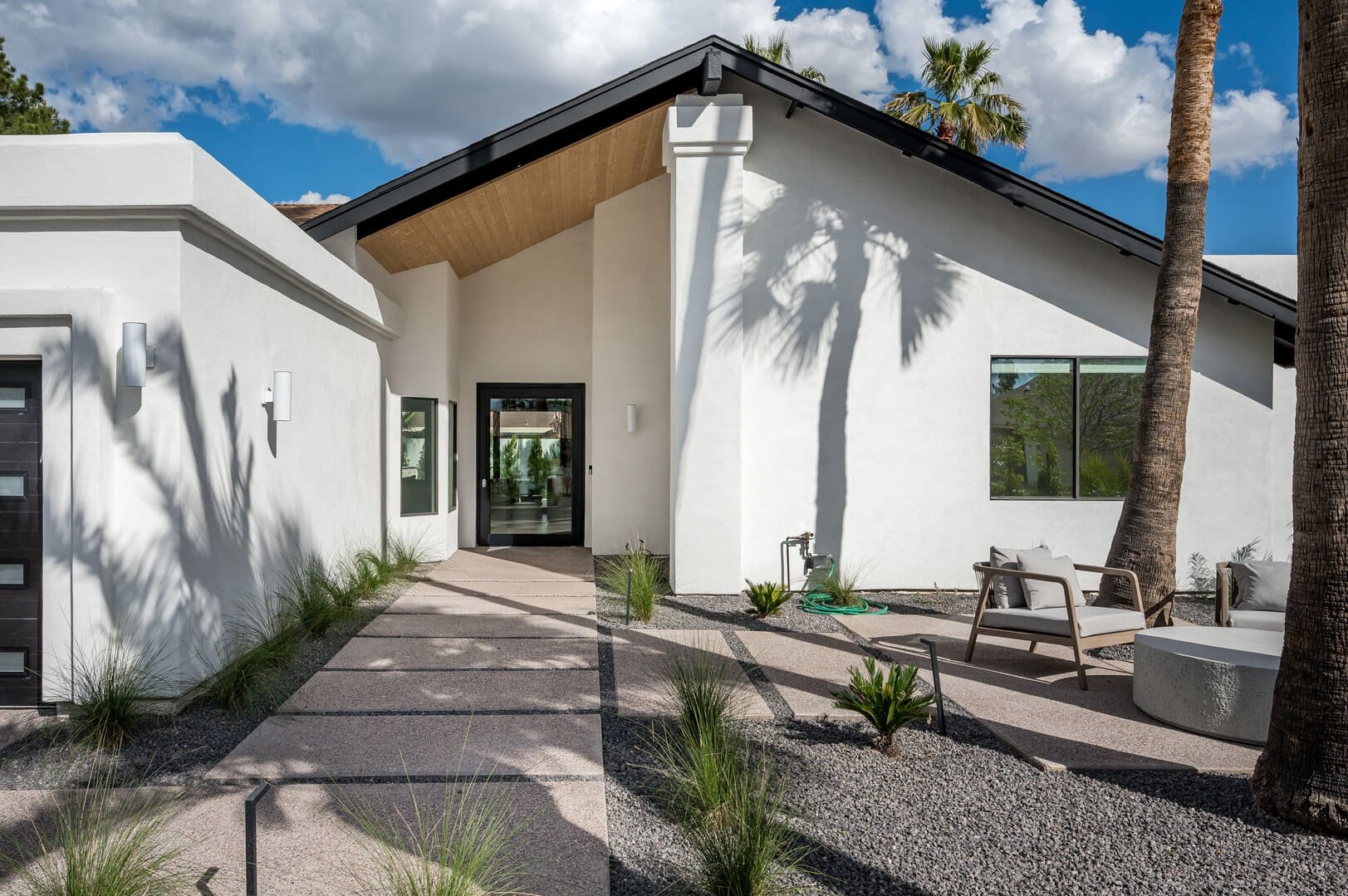 Modern house exterior with garden.