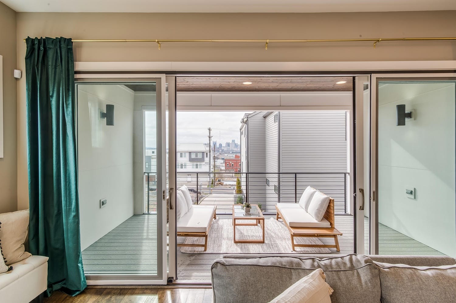 Cozy balcony view through doors.