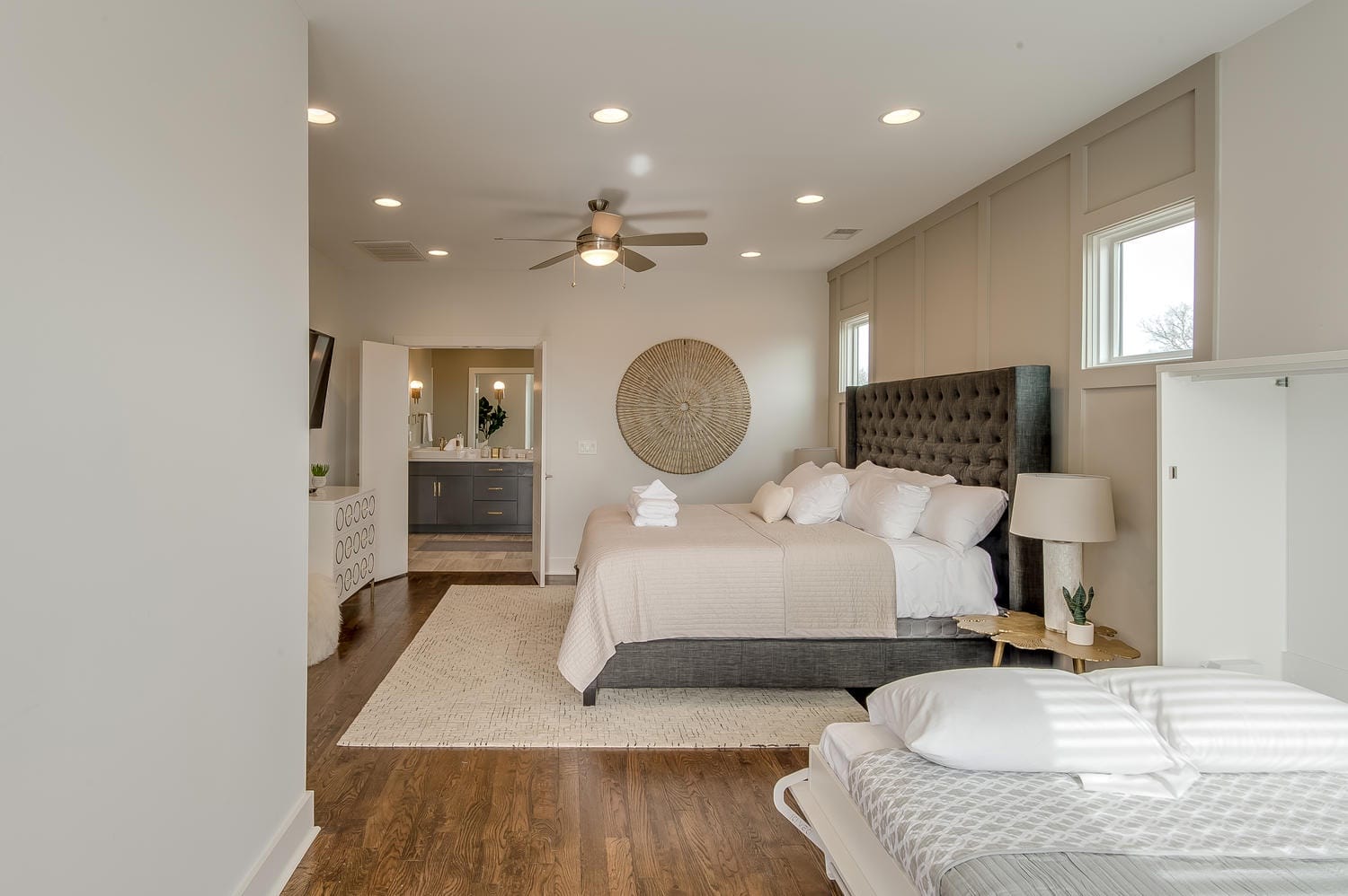 Modern bedroom with attached bathroom.