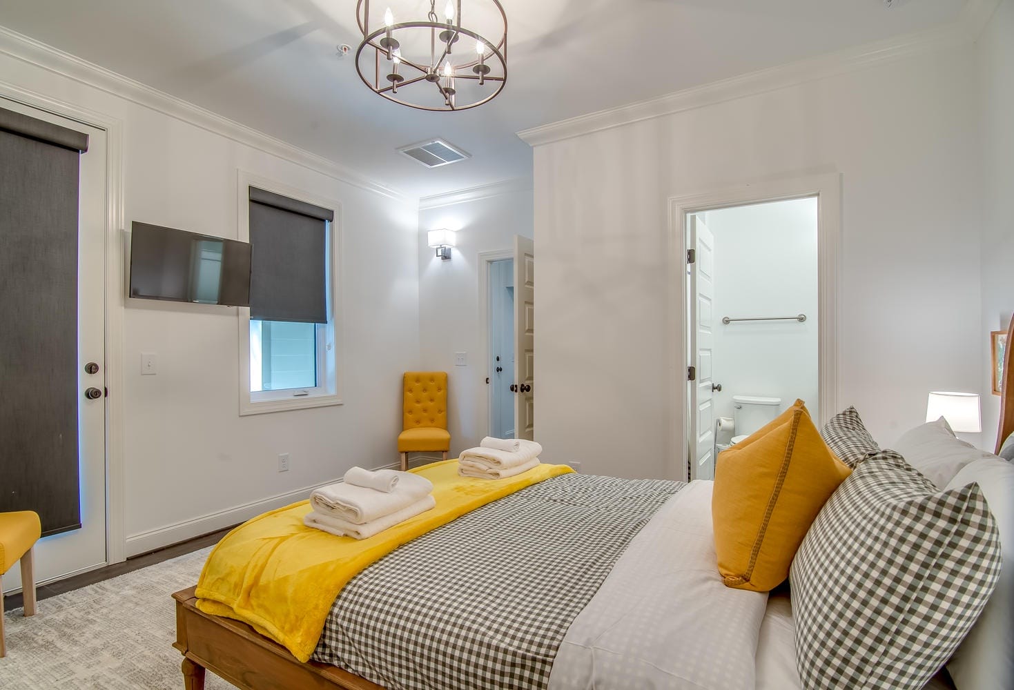 Modern bedroom with yellow accents.