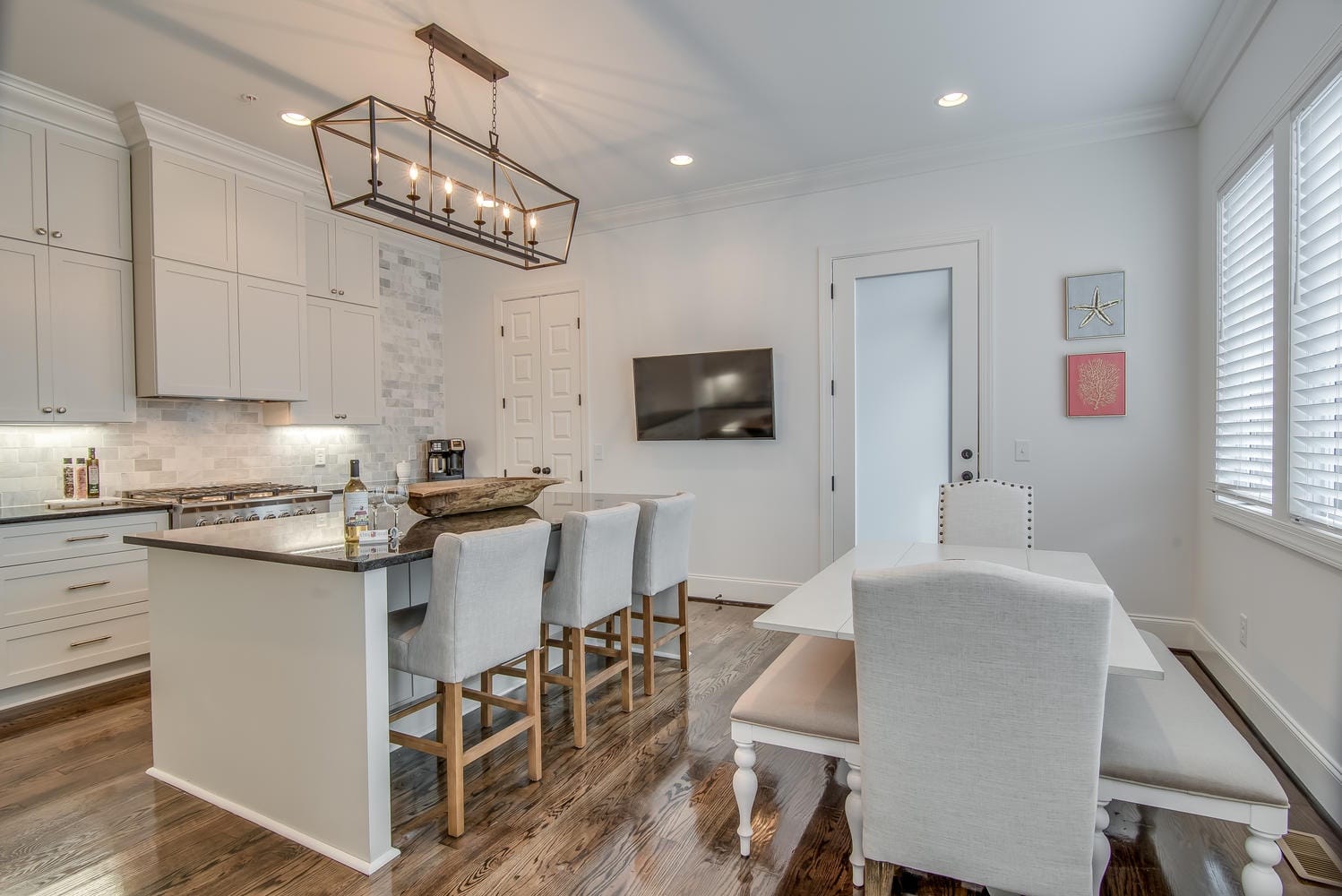 Modern kitchen and dining area.