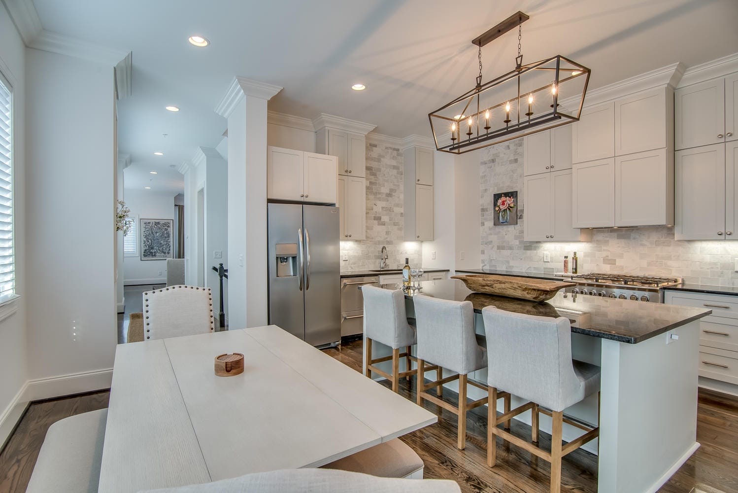 Modern kitchen with dining table.